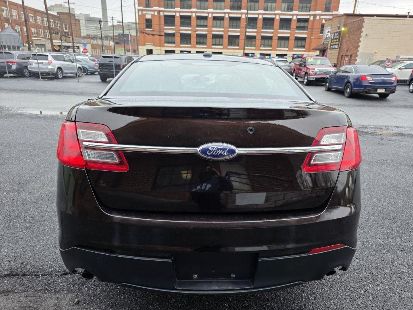 2013 BROWN FORD TAURUS POLICE INTERCEPTOR (1FAHP2MKXDG) with an 3.7L engine, Automatic transmission, located at 117 North Cameron Street, Harrisburg, PA, 17101, (717) 963-8962, 40.267021, -76.875351 - WE FINANCE!!! Good Credit/ Bad Credit/ No Credit - ALL Trade-Ins Welcomed!!! ***Guaranteed Credit Approval*** APPLY ONLINE or CALL us TODAY ;) Please call us to discuss your cash and financing options. - Photo#3