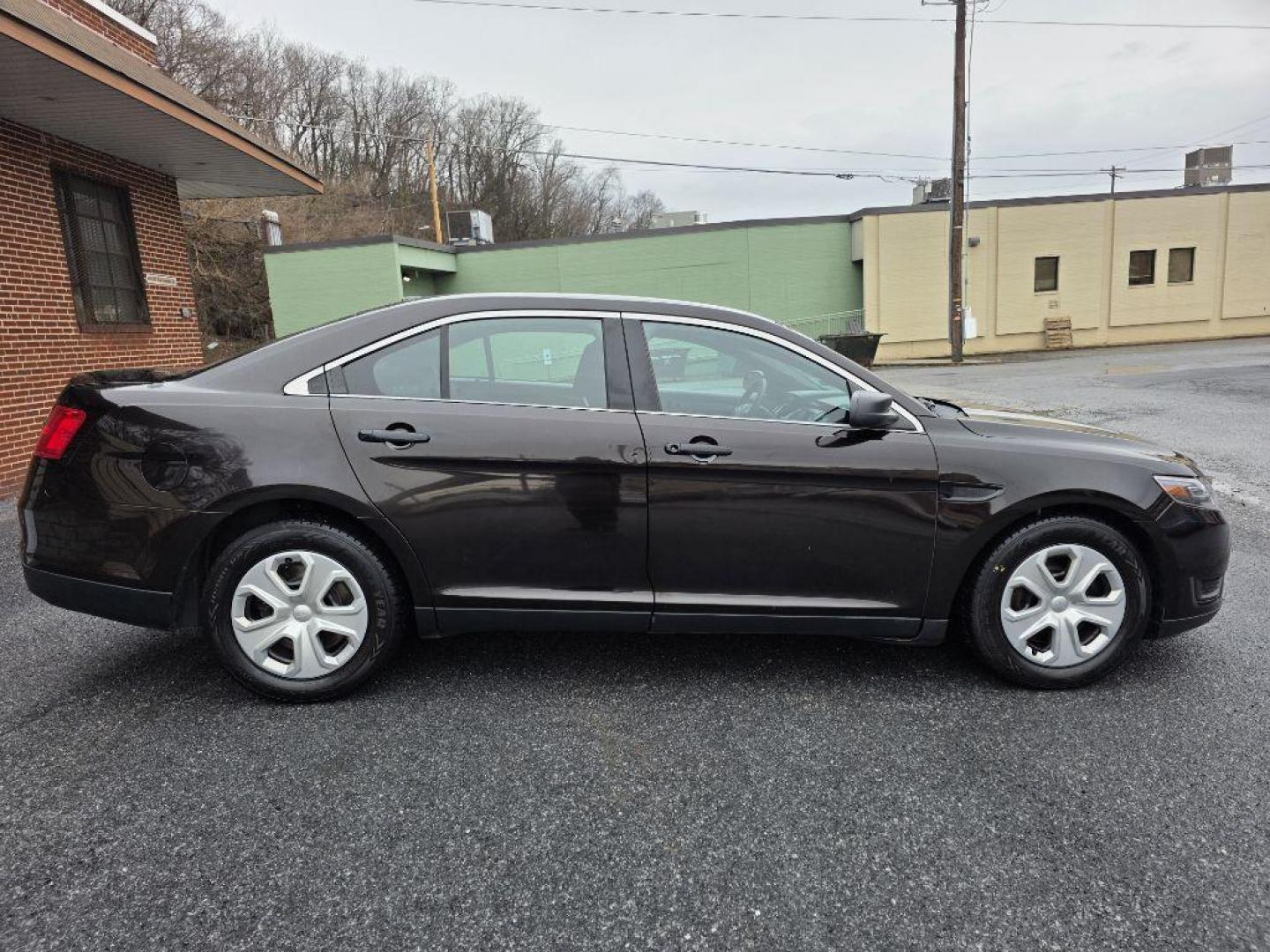 2013 BROWN FORD TAURUS POLICE INTERCEPTOR (1FAHP2MKXDG) with an 3.7L engine, Automatic transmission, located at 117 North Cameron Street, Harrisburg, PA, 17101, (717) 963-8962, 40.267021, -76.875351 - WE FINANCE!!! Good Credit/ Bad Credit/ No Credit - ALL Trade-Ins Welcomed!!! ***Guaranteed Credit Approval*** APPLY ONLINE or CALL us TODAY ;) Please call us to discuss your cash and financing options. - Photo#5