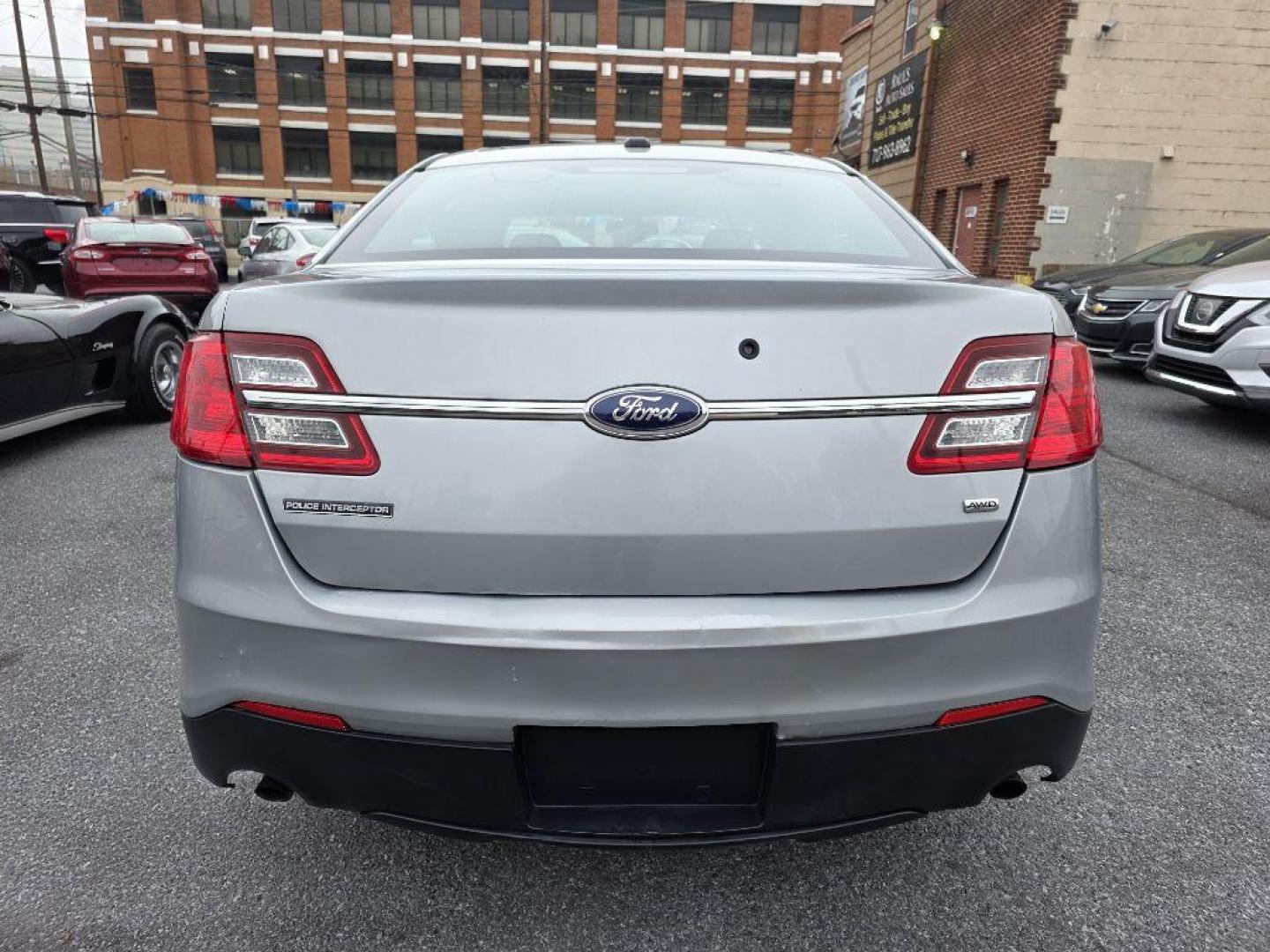 2013 SILVER FORD TAURUS POLICE INTERCEPTOR (1FAHP2M87DG) with an 3.5L engine, Automatic transmission, located at 117 North Cameron Street, Harrisburg, PA, 17101, (717) 963-8962, 40.267021, -76.875351 - WE FINANCE!!! Good Credit/ Bad Credit/ No Credit - ALL Trade-Ins Welcomed!!! ***Guaranteed Credit Approval*** APPLY ONLINE or CALL us TODAY ;) Please call us to discuss your cash and financing options. - Photo#2