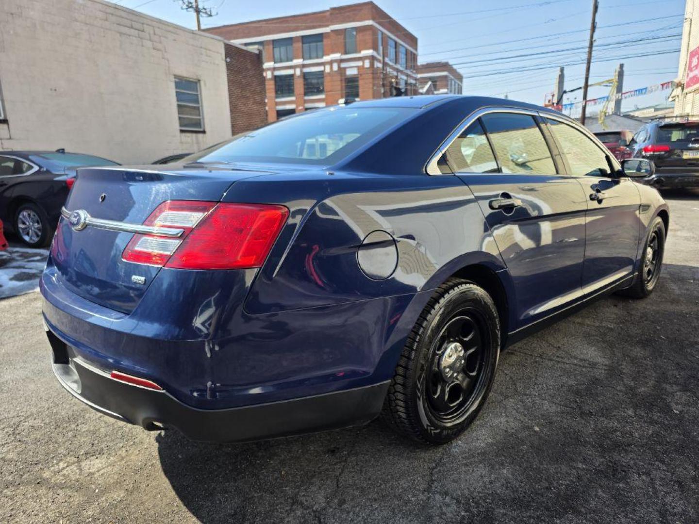 2013 BLUE FORD TAURUS POLICE INTERCEPTOR (1FAHP2M83DG) with an 3.5L engine, Automatic transmission, located at 117 North Cameron Street, Harrisburg, PA, 17101, (717) 963-8962, 40.267021, -76.875351 - WE FINANCE!!! Good Credit/ Challenged Credit/ No Credit - ALL Trade-Ins Welcomed!!! APPLY ONLINE or CALL us TODAY ;) Please call us to discuss your cash and/or financing options. - Photo#5
