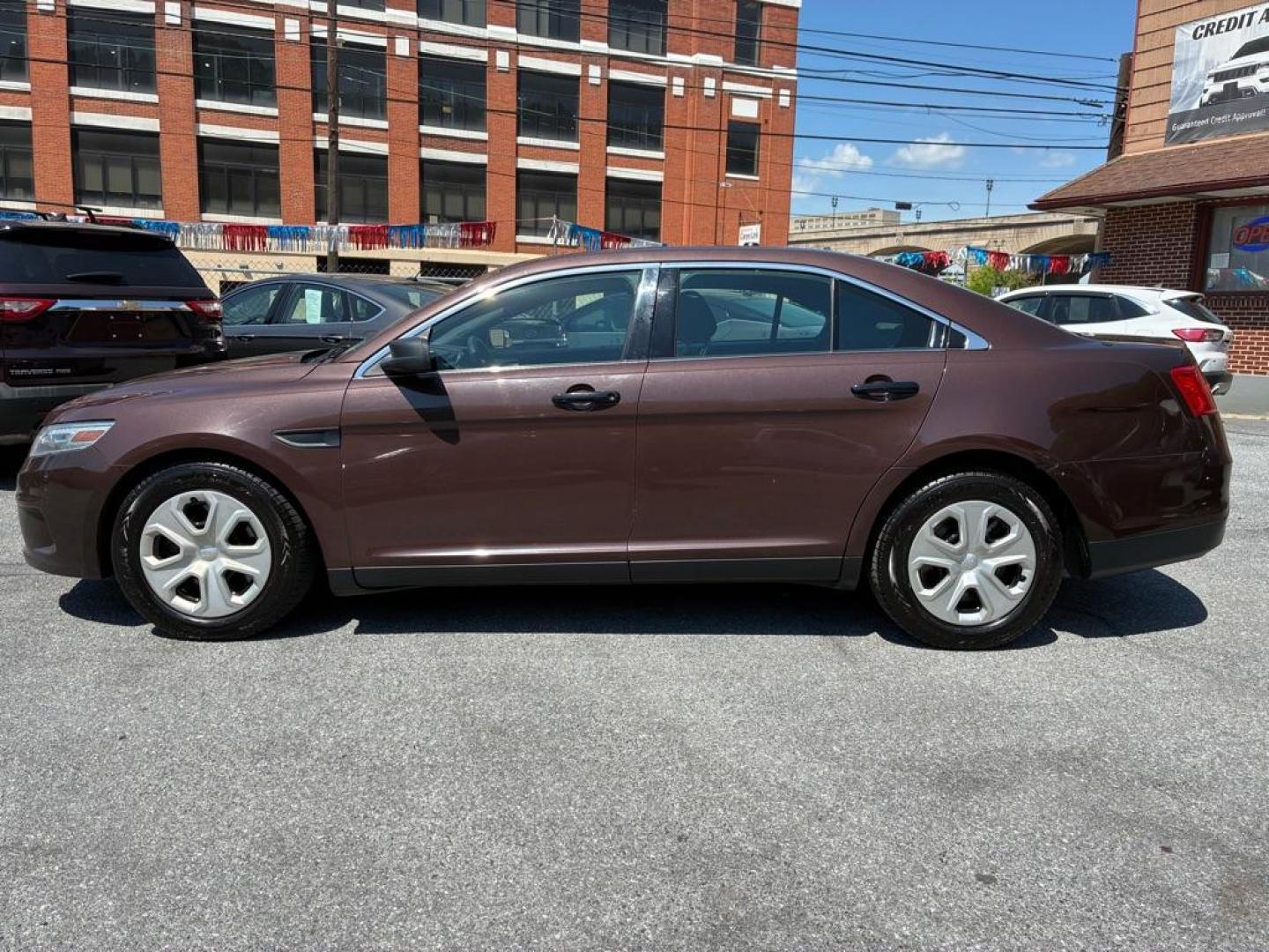 2013 BROWN FORD TAURUS POLICE INTERCEPTOR (1FAHP2M84DG) with an 3.5L engine, Automatic transmission, located at 117 North Cameron Street, Harrisburg, PA, 17101, (717) 963-8962, 40.267021, -76.875351 - WE FINANCE!!! MOST vehicles are available for financing. Good Credit/ Challenged Credit/ No Credit - ALL Trade-Ins Welcomed!!! APPLY ONLINE or CALL us TODAY Please call us to discuss your cash and/or financing options. Thanks for cheching our inventory! We're here to help. - Photo#1