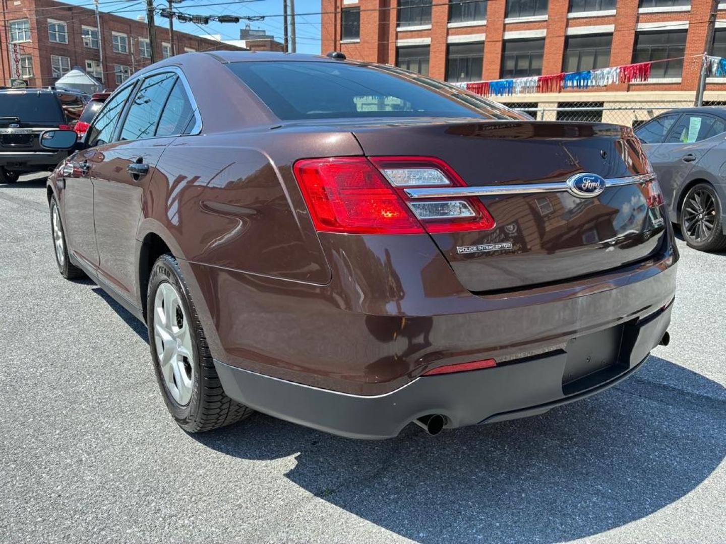 2013 BROWN FORD TAURUS POLICE INTERCEPTOR (1FAHP2M84DG) with an 3.5L engine, Automatic transmission, located at 117 North Cameron Street, Harrisburg, PA, 17101, (717) 963-8962, 40.267021, -76.875351 - WE FINANCE!!! MOST vehicles are available for financing. Good Credit/ Challenged Credit/ No Credit - ALL Trade-Ins Welcomed!!! APPLY ONLINE or CALL us TODAY Please call us to discuss your cash and/or financing options. Thanks for cheching our inventory! We're here to help. - Photo#2