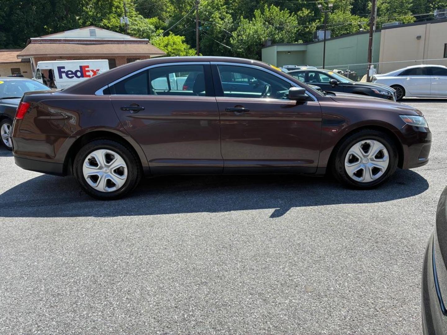 2013 BROWN FORD TAURUS POLICE INTERCEPTOR (1FAHP2M84DG) with an 3.5L engine, Automatic transmission, located at 117 North Cameron Street, Harrisburg, PA, 17101, (717) 963-8962, 40.267021, -76.875351 - WE FINANCE!!! MOST vehicles are available for financing. Good Credit/ Challenged Credit/ No Credit - ALL Trade-Ins Welcomed!!! APPLY ONLINE or CALL us TODAY Please call us to discuss your cash and/or financing options. Thanks for cheching our inventory! We're here to help. - Photo#5