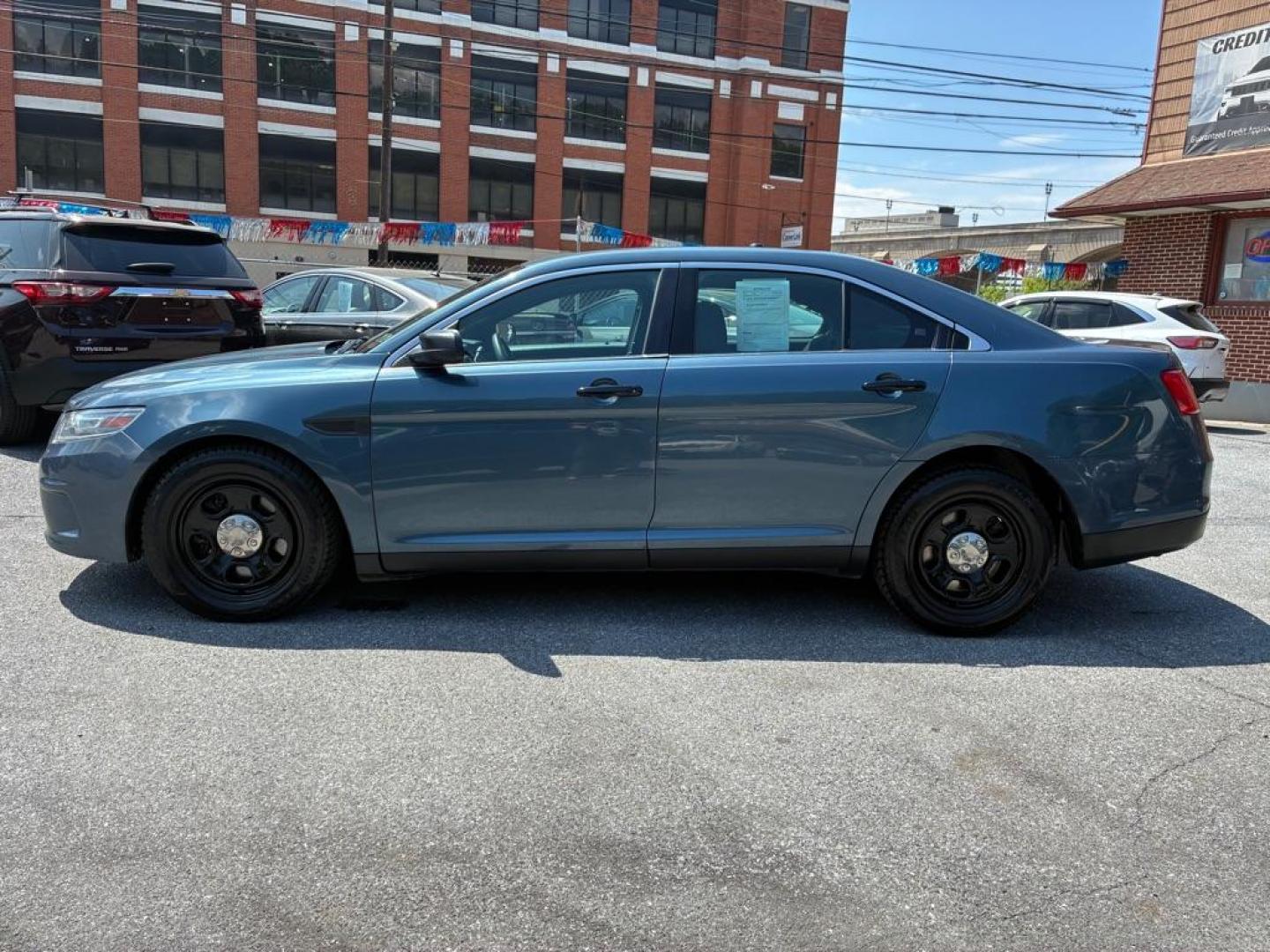 2013 BLUE FORD TAURUS POLICE INTERCEPTOR (1FAHP2M80DG) with an 3.5L engine, Automatic transmission, located at 117 North Cameron Street, Harrisburg, PA, 17101, (717) 963-8962, 40.267021, -76.875351 - WE FINANCE!!! MOST vehicles are available for financing. Good Credit/ Challenged Credit/ No Credit - ALL Trade-Ins Welcomed!!! APPLY ONLINE or CALL us TODAY Please call us to discuss your cash and/or financing options. Thanks for cheching our inventory! We're here to help. - Photo#1