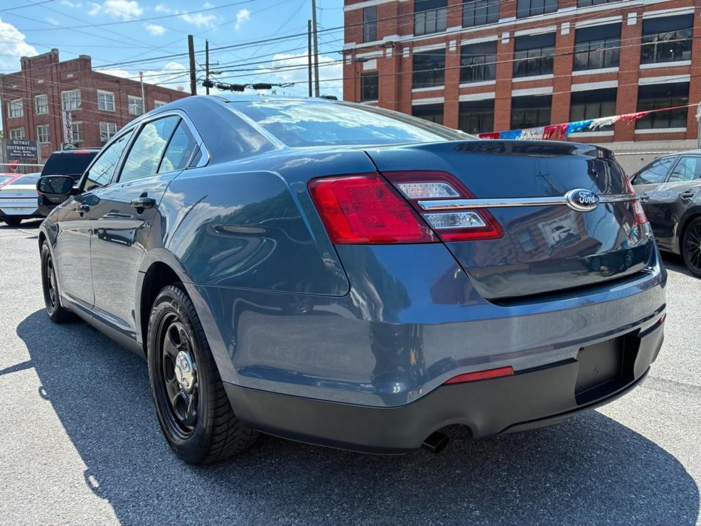 2013 BLUE FORD TAURUS POLICE INTERCEPTOR (1FAHP2M80DG) with an 3.5L engine, Automatic transmission, located at 117 North Cameron Street, Harrisburg, PA, 17101, (717) 963-8962, 40.267021, -76.875351 - WE FINANCE!!! MOST vehicles are available for financing. Good Credit/ Challenged Credit/ No Credit - ALL Trade-Ins Welcomed!!! APPLY ONLINE or CALL us TODAY Please call us to discuss your cash and/or financing options. Thanks for cheching our inventory! We're here to help. - Photo#2
