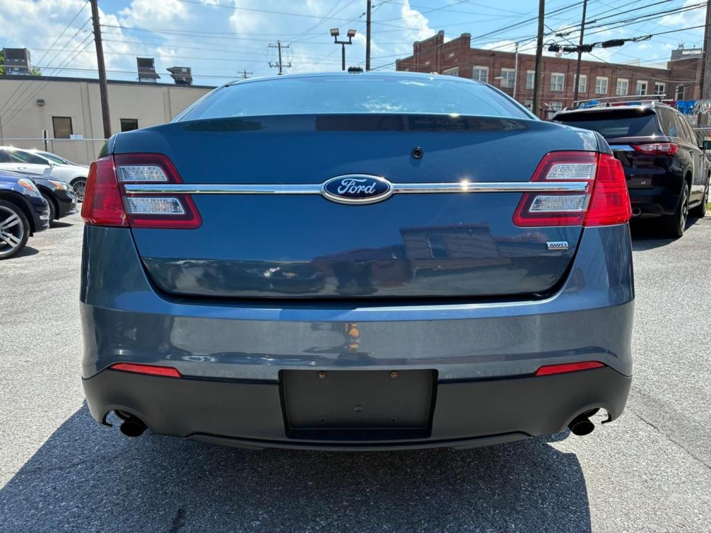 2013 BLUE FORD TAURUS POLICE INTERCEPTOR (1FAHP2M80DG) with an 3.5L engine, Automatic transmission, located at 117 North Cameron Street, Harrisburg, PA, 17101, (717) 963-8962, 40.267021, -76.875351 - WE FINANCE!!! MOST vehicles are available for financing. Good Credit/ Challenged Credit/ No Credit - ALL Trade-Ins Welcomed!!! APPLY ONLINE or CALL us TODAY Please call us to discuss your cash and/or financing options. Thanks for cheching our inventory! We're here to help. - Photo#3