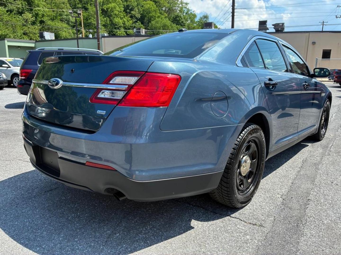 2013 BLUE FORD TAURUS POLICE INTERCEPTOR (1FAHP2M80DG) with an 3.5L engine, Automatic transmission, located at 117 North Cameron Street, Harrisburg, PA, 17101, (717) 963-8962, 40.267021, -76.875351 - WE FINANCE!!! MOST vehicles are available for financing. Good Credit/ Challenged Credit/ No Credit - ALL Trade-Ins Welcomed!!! APPLY ONLINE or CALL us TODAY Please call us to discuss your cash and/or financing options. Thanks for cheching our inventory! We're here to help. - Photo#4