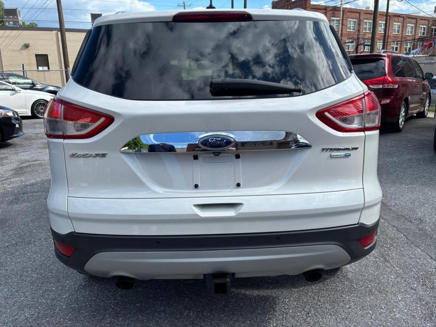 2014 WHITE FORD ESCAPE TITANIUM (1FMCU9J93EU) with an 2.0L engine, Automatic transmission, located at 117 North Cameron Street, Harrisburg, PA, 17101, (717) 963-8962, 40.267021, -76.875351 - WE FINANCE!!! MOST vehicles are available for financing. Good Credit/ Challenged Credit/ No Credit - ALL Trade-Ins Welcomed!!! APPLY ONLINE or CALL us TODAY Please call us to discuss your cash and/or financing options. Thanks for checking our inventory! We're here to help. - Photo#3