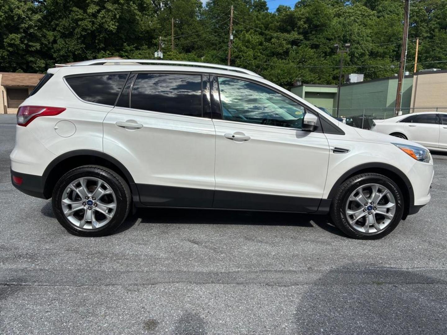 2014 WHITE FORD ESCAPE TITANIUM (1FMCU9J93EU) with an 2.0L engine, Automatic transmission, located at 117 North Cameron Street, Harrisburg, PA, 17101, (717) 963-8962, 40.267021, -76.875351 - WE FINANCE!!! MOST vehicles are available for financing. Good Credit/ Challenged Credit/ No Credit - ALL Trade-Ins Welcomed!!! APPLY ONLINE or CALL us TODAY Please call us to discuss your cash and/or financing options. Thanks for checking our inventory! We're here to help. - Photo#5