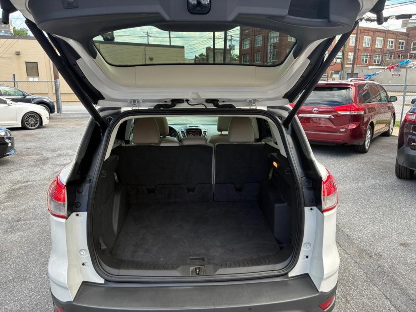 2014 WHITE FORD ESCAPE TITANIUM (1FMCU9J93EU) with an 2.0L engine, Automatic transmission, located at 117 North Cameron Street, Harrisburg, PA, 17101, (717) 963-8962, 40.267021, -76.875351 - WE FINANCE!!! MOST vehicles are available for financing. Good Credit/ Challenged Credit/ No Credit - ALL Trade-Ins Welcomed!!! APPLY ONLINE or CALL us TODAY Please call us to discuss your cash and/or financing options. Thanks for checking our inventory! We're here to help. - Photo#10