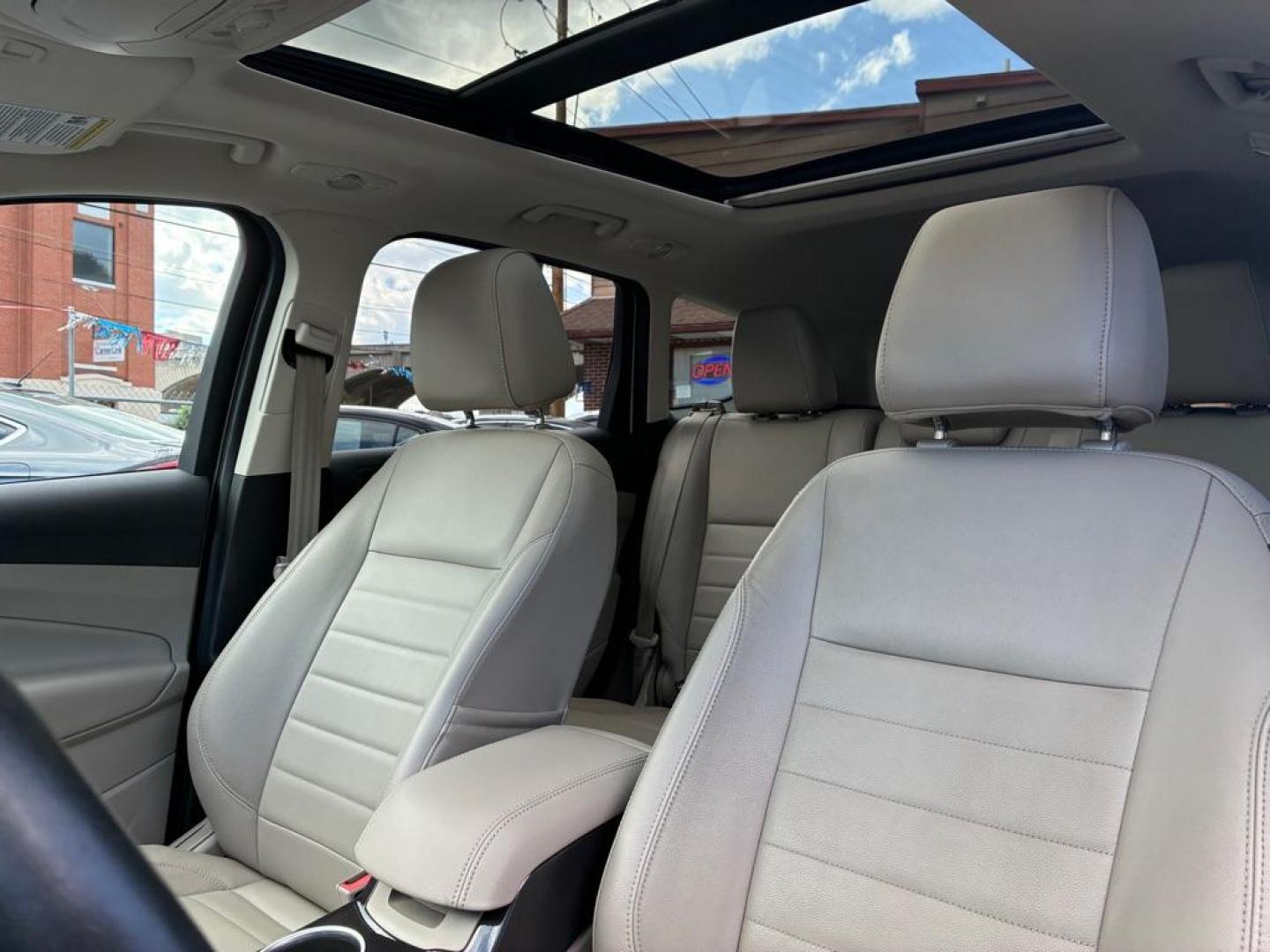 2014 WHITE FORD ESCAPE TITANIUM (1FMCU9J93EU) with an 2.0L engine, Automatic transmission, located at 117 North Cameron Street, Harrisburg, PA, 17101, (717) 963-8962, 40.267021, -76.875351 - WE FINANCE!!! MOST vehicles are available for financing. Good Credit/ Challenged Credit/ No Credit - ALL Trade-Ins Welcomed!!! APPLY ONLINE or CALL us TODAY Please call us to discuss your cash and/or financing options. Thanks for checking our inventory! We're here to help. - Photo#14