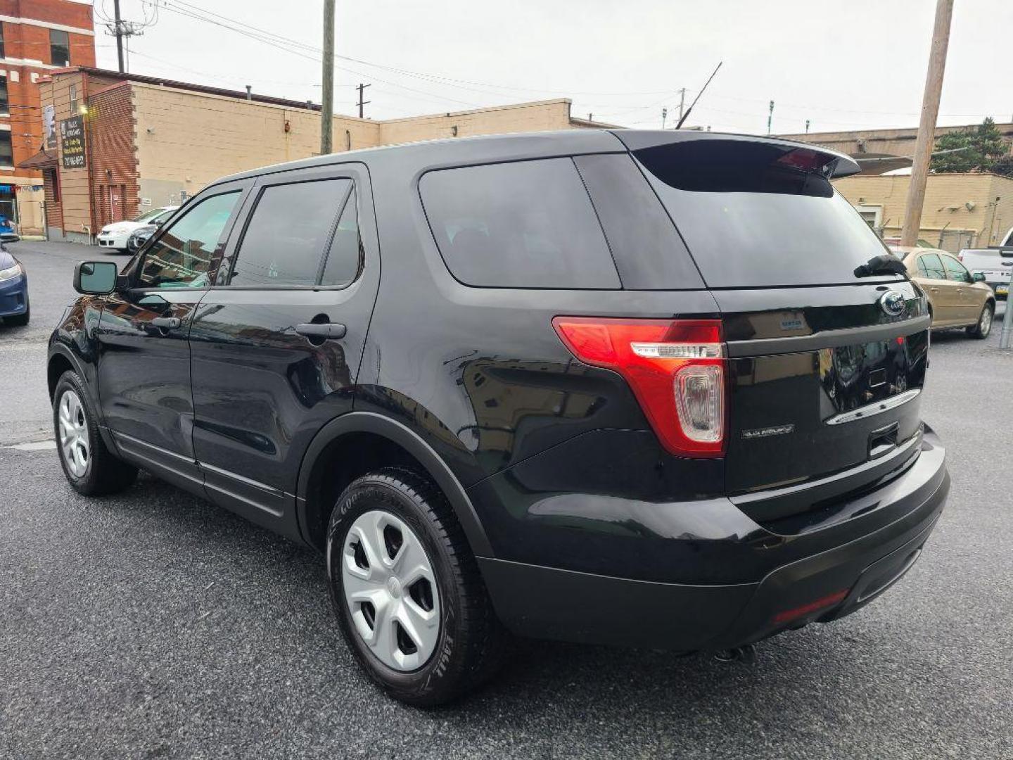 2014 BLACK FORD EXPLORER POLICE INTERCEPTOR (1FM5K8ARXEG) with an 3.7L engine, Automatic transmission, located at 7981 Paxton Street, Harrisburg, PA, 17111, (717) 561-2926, 40.261490, -76.749229 - WE FINANCE!!! Good Credit/ Bad Credit/ No Credit - ALL Trade-Ins Welcomed!!! ***Guaranteed Credit Approval*** APPLY ONLINE or CALL us TODAY ;) Internet Prices and Marketplace Prices are SPECIAL discounted ***CASH DEALS*** Retail Prices are higher. Please call us to discuss your cash and finan - Photo#2