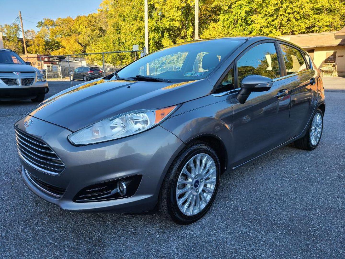 2014 GRAY FORD FIESTA TITANIUM (3FADP4FJ1EM) with an 1.6L engine, Automatic transmission, located at 117 North Cameron Street, Harrisburg, PA, 17101, (717) 963-8962, 40.267021, -76.875351 - WE FINANCE!!! Good Credit/ Bad Credit/ No Credit - ALL Trade-Ins Welcomed!!! ***Guaranteed Credit Approval*** APPLY ONLINE or CALL us TODAY ;) Internet Prices and Marketplace Prices are SPECIAL discounted ***CASH DEALS*** Retail Prices are higher. Please call us to discuss your cash and finan - Photo#0