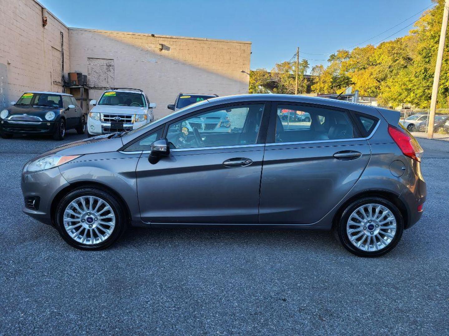 2014 GRAY FORD FIESTA TITANIUM (3FADP4FJ1EM) with an 1.6L engine, Automatic transmission, located at 117 North Cameron Street, Harrisburg, PA, 17101, (717) 963-8962, 40.267021, -76.875351 - WE FINANCE!!! Good Credit/ Bad Credit/ No Credit - ALL Trade-Ins Welcomed!!! ***Guaranteed Credit Approval*** APPLY ONLINE or CALL us TODAY ;) Internet Prices and Marketplace Prices are SPECIAL discounted ***CASH DEALS*** Retail Prices are higher. Please call us to discuss your cash and finan - Photo#1