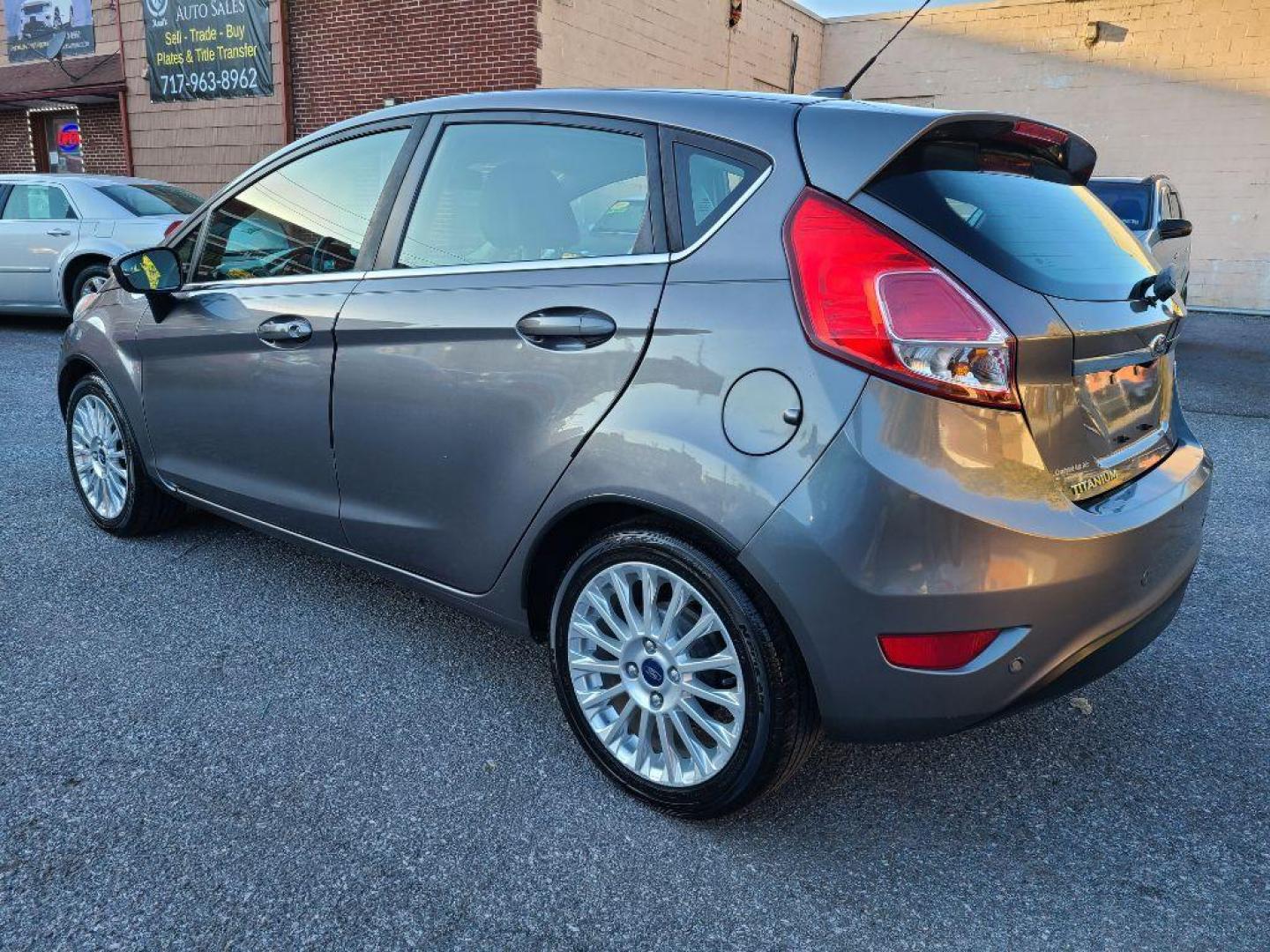 2014 GRAY FORD FIESTA TITANIUM (3FADP4FJ1EM) with an 1.6L engine, Automatic transmission, located at 117 North Cameron Street, Harrisburg, PA, 17101, (717) 963-8962, 40.267021, -76.875351 - WE FINANCE!!! Good Credit/ Bad Credit/ No Credit - ALL Trade-Ins Welcomed!!! ***Guaranteed Credit Approval*** APPLY ONLINE or CALL us TODAY ;) Internet Prices and Marketplace Prices are SPECIAL discounted ***CASH DEALS*** Retail Prices are higher. Please call us to discuss your cash and finan - Photo#2