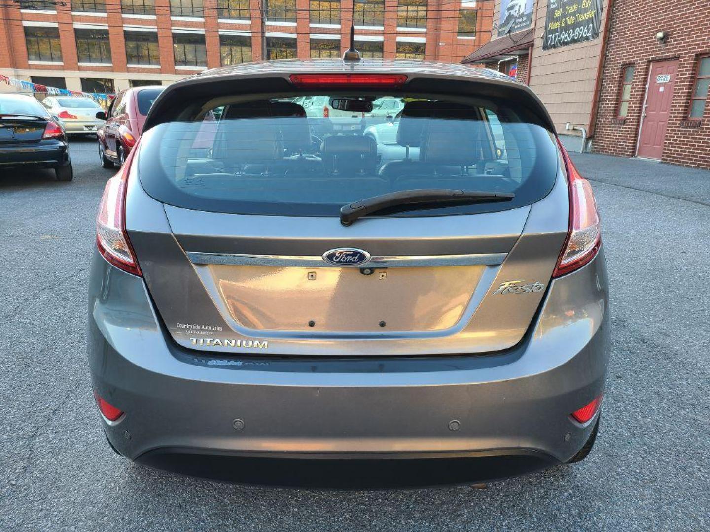 2014 GRAY FORD FIESTA TITANIUM (3FADP4FJ1EM) with an 1.6L engine, Automatic transmission, located at 117 North Cameron Street, Harrisburg, PA, 17101, (717) 963-8962, 40.267021, -76.875351 - WE FINANCE!!! Good Credit/ Bad Credit/ No Credit - ALL Trade-Ins Welcomed!!! ***Guaranteed Credit Approval*** APPLY ONLINE or CALL us TODAY ;) Internet Prices and Marketplace Prices are SPECIAL discounted ***CASH DEALS*** Retail Prices are higher. Please call us to discuss your cash and finan - Photo#3