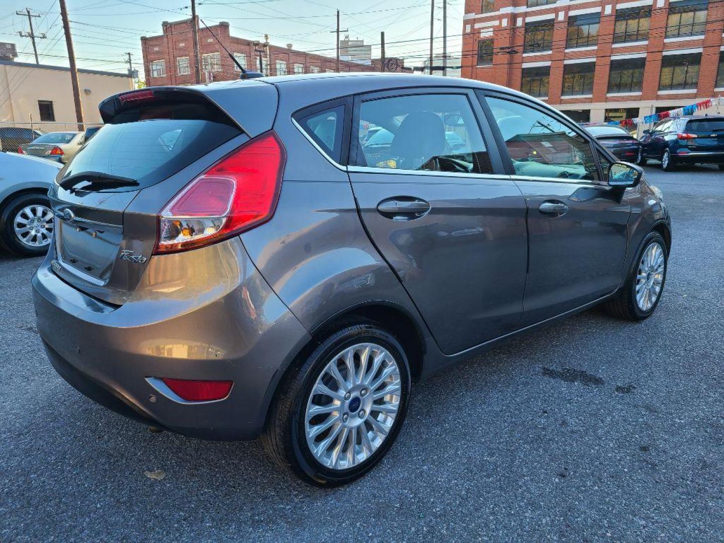2014 GRAY FORD FIESTA TITANIUM (3FADP4FJ1EM) with an 1.6L engine, Automatic transmission, located at 117 North Cameron Street, Harrisburg, PA, 17101, (717) 963-8962, 40.267021, -76.875351 - WE FINANCE!!! Good Credit/ Bad Credit/ No Credit - ALL Trade-Ins Welcomed!!! ***Guaranteed Credit Approval*** APPLY ONLINE or CALL us TODAY ;) Internet Prices and Marketplace Prices are SPECIAL discounted ***CASH DEALS*** Retail Prices are higher. Please call us to discuss your cash and finan - Photo#4