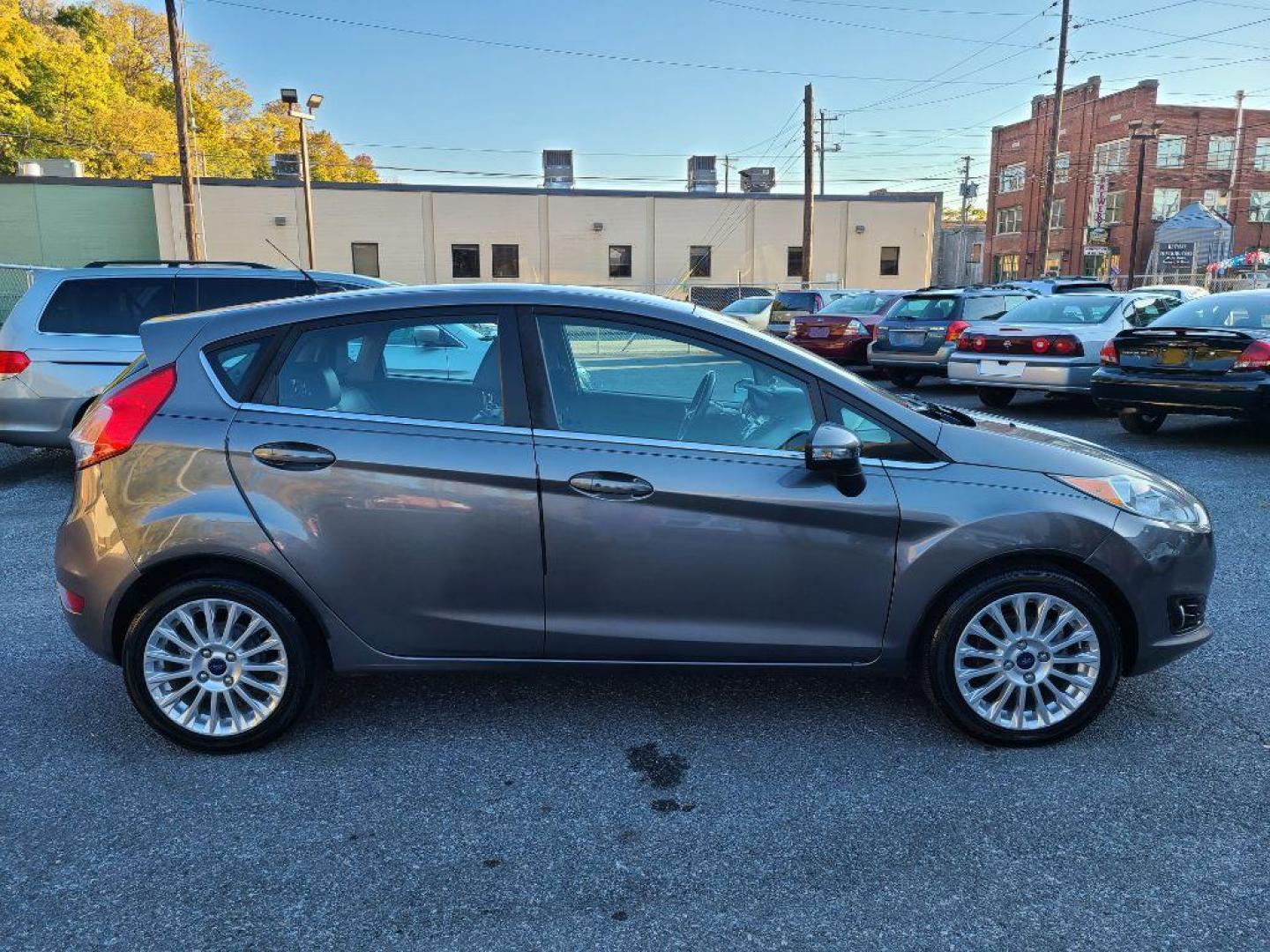 2014 GRAY FORD FIESTA TITANIUM (3FADP4FJ1EM) with an 1.6L engine, Automatic transmission, located at 117 North Cameron Street, Harrisburg, PA, 17101, (717) 963-8962, 40.267021, -76.875351 - WE FINANCE!!! Good Credit/ Bad Credit/ No Credit - ALL Trade-Ins Welcomed!!! ***Guaranteed Credit Approval*** APPLY ONLINE or CALL us TODAY ;) Internet Prices and Marketplace Prices are SPECIAL discounted ***CASH DEALS*** Retail Prices are higher. Please call us to discuss your cash and finan - Photo#5