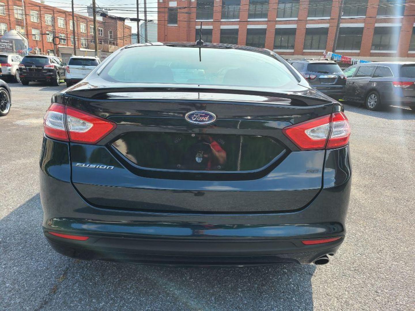 2014 GRAY FORD FUSION SE (3FA6P0H78ER) with an 2.5L engine, Automatic transmission, located at 117 North Cameron Street, Harrisburg, PA, 17101, (717) 963-8962, 40.267021, -76.875351 - WE FINANCE!!! Good Credit/ Bad Credit/ No Credit - ALL Trade-Ins Welcomed!!! ***Guaranteed Credit Approval*** APPLY ONLINE or CALL us TODAY ;) Internet Prices and Marketplace Prices are SPECIAL discounted ***CASH DEALS*** Retail Prices are higher. Please call us to discuss your cash and finan - Photo#2