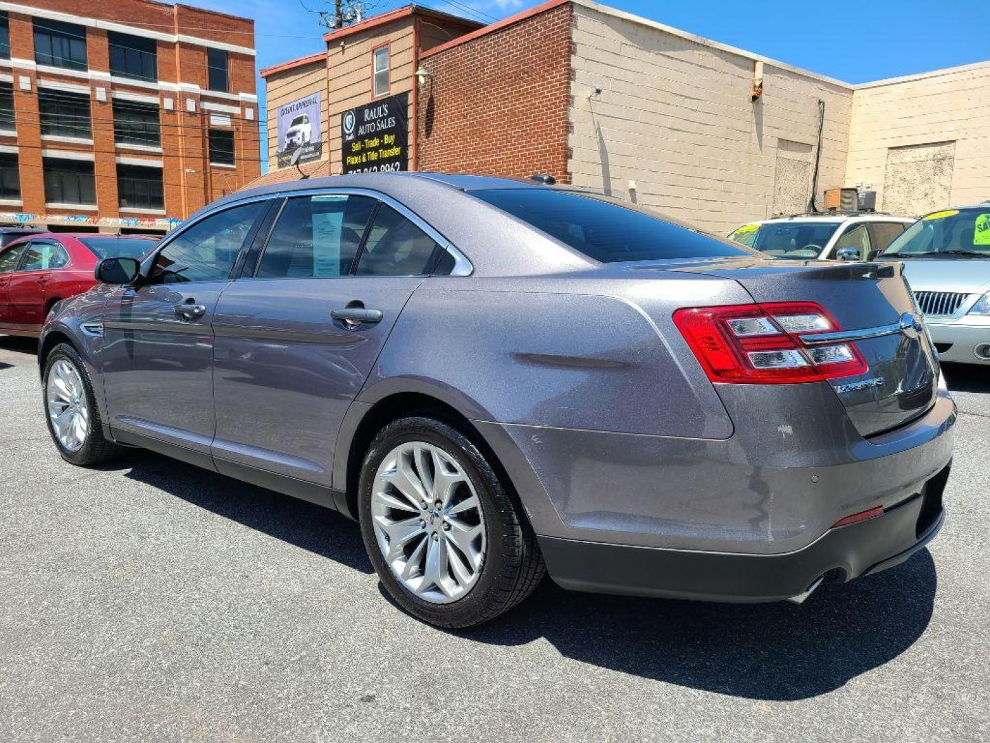 2014 GRAY FORD TAURUS LIMITED (1FAHP2F8XEG) with an 3.5L engine, Automatic transmission, located at 117 North Cameron Street, Harrisburg, PA, 17101, (717) 963-8962, 40.267021, -76.875351 - WE FINANCE!!! Good Credit/ Bad Credit/ No Credit - ALL Trade-Ins Welcomed!!! ***Guaranteed Credit Approval*** APPLY ONLINE or CALL us TODAY ;) Internet Prices and Marketplace Prices are SPECIAL discounted ***CASH DEALS*** Retail Prices are higher. Please call us to discuss your cash and finan - Photo#2