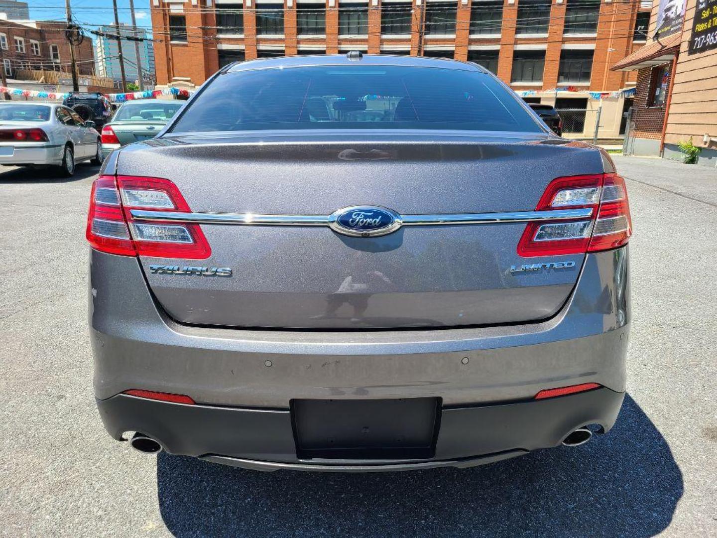 2014 GRAY FORD TAURUS LIMITED (1FAHP2F8XEG) with an 3.5L engine, Automatic transmission, located at 117 North Cameron Street, Harrisburg, PA, 17101, (717) 963-8962, 40.267021, -76.875351 - WE FINANCE!!! Good Credit/ Bad Credit/ No Credit - ALL Trade-Ins Welcomed!!! ***Guaranteed Credit Approval*** APPLY ONLINE or CALL us TODAY ;) Internet Prices and Marketplace Prices are SPECIAL discounted ***CASH DEALS*** Retail Prices are higher. Please call us to discuss your cash and finan - Photo#3