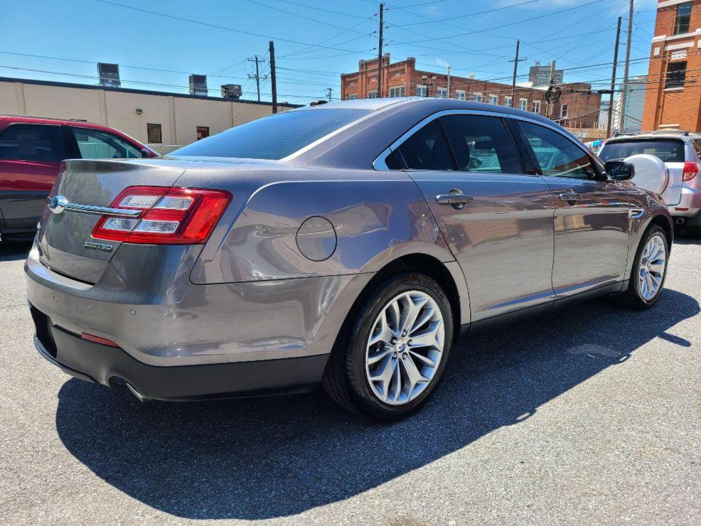 2014 GRAY FORD TAURUS LIMITED (1FAHP2F8XEG) with an 3.5L engine, Automatic transmission, located at 117 North Cameron Street, Harrisburg, PA, 17101, (717) 963-8962, 40.267021, -76.875351 - WE FINANCE!!! Good Credit/ Bad Credit/ No Credit - ALL Trade-Ins Welcomed!!! ***Guaranteed Credit Approval*** APPLY ONLINE or CALL us TODAY ;) Internet Prices and Marketplace Prices are SPECIAL discounted ***CASH DEALS*** Retail Prices are higher. Please call us to discuss your cash and finan - Photo#4