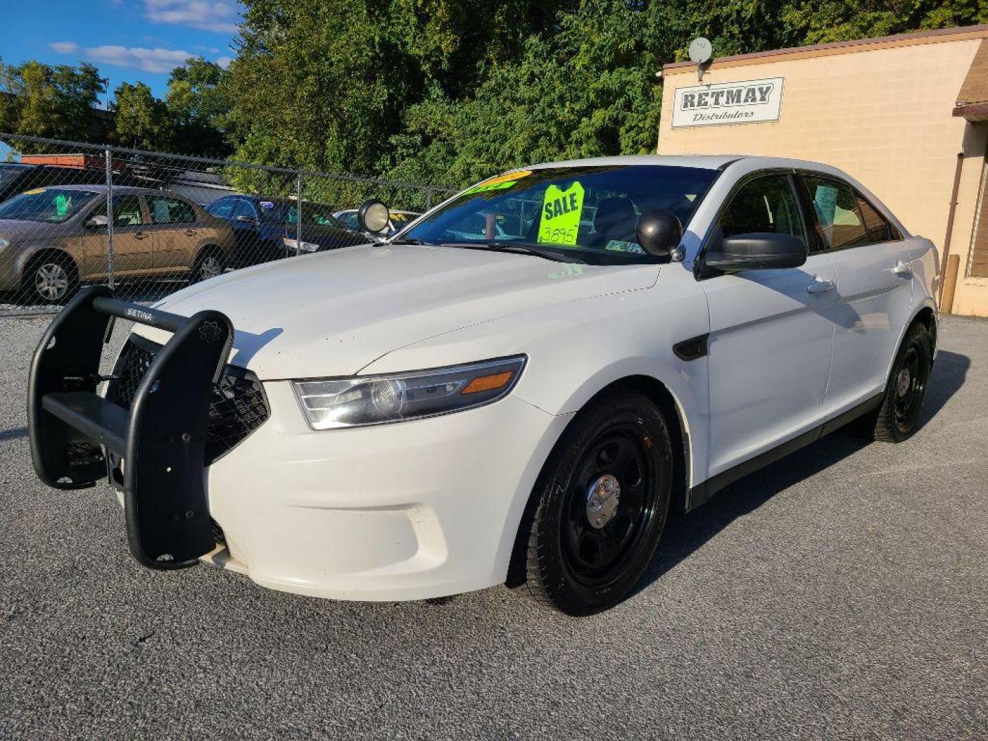 2014 WHITE FORD TAURUS POLICE INTERCEPTOR (1FAHP2MK5EG) with an 3.7L engine, Automatic transmission, located at 117 North Cameron Street, Harrisburg, PA, 17101, (717) 963-8962, 40.267021, -76.875351 - WE FINANCE!!! Good Credit/ Bad Credit/ No Credit - ALL Trade-Ins Welcomed!!! ***Guaranteed Credit Approval*** APPLY ONLINE or CALL us TODAY ;) Please call us to discuss your cash and financing options. - Photo#0