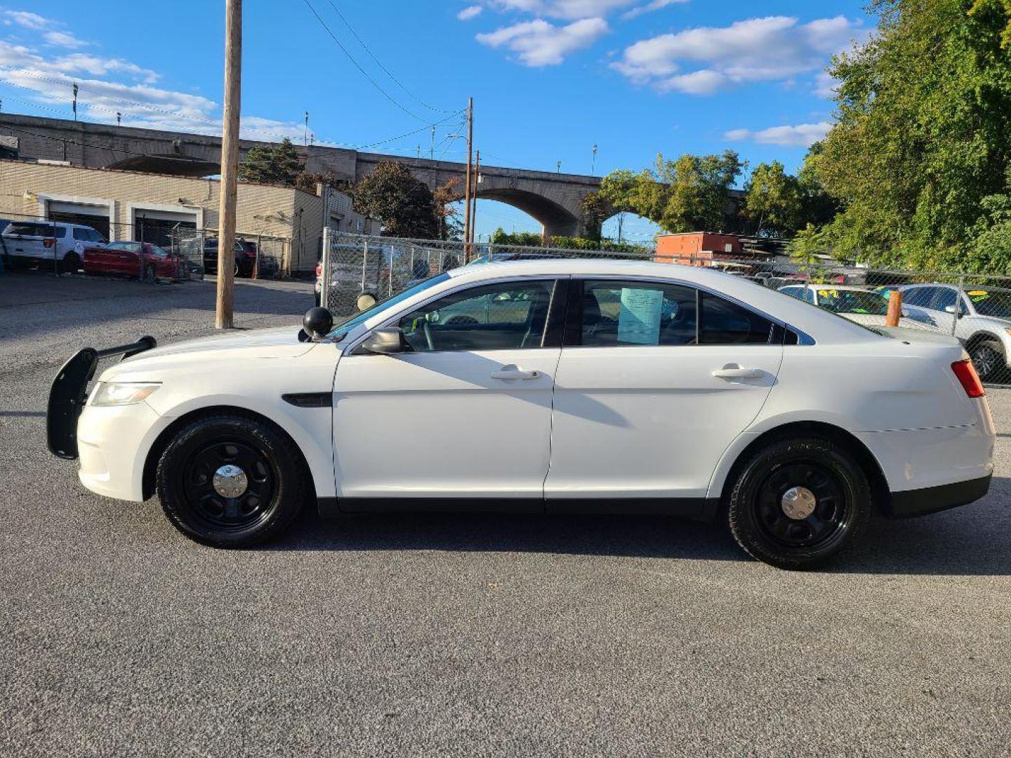 2014 WHITE FORD TAURUS POLICE INTERCEPTOR (1FAHP2MK5EG) with an 3.7L engine, Automatic transmission, located at 117 North Cameron Street, Harrisburg, PA, 17101, (717) 963-8962, 40.267021, -76.875351 - WE FINANCE!!! Good Credit/ Bad Credit/ No Credit - ALL Trade-Ins Welcomed!!! ***Guaranteed Credit Approval*** APPLY ONLINE or CALL us TODAY ;) Please call us to discuss your cash and financing options. - Photo#1