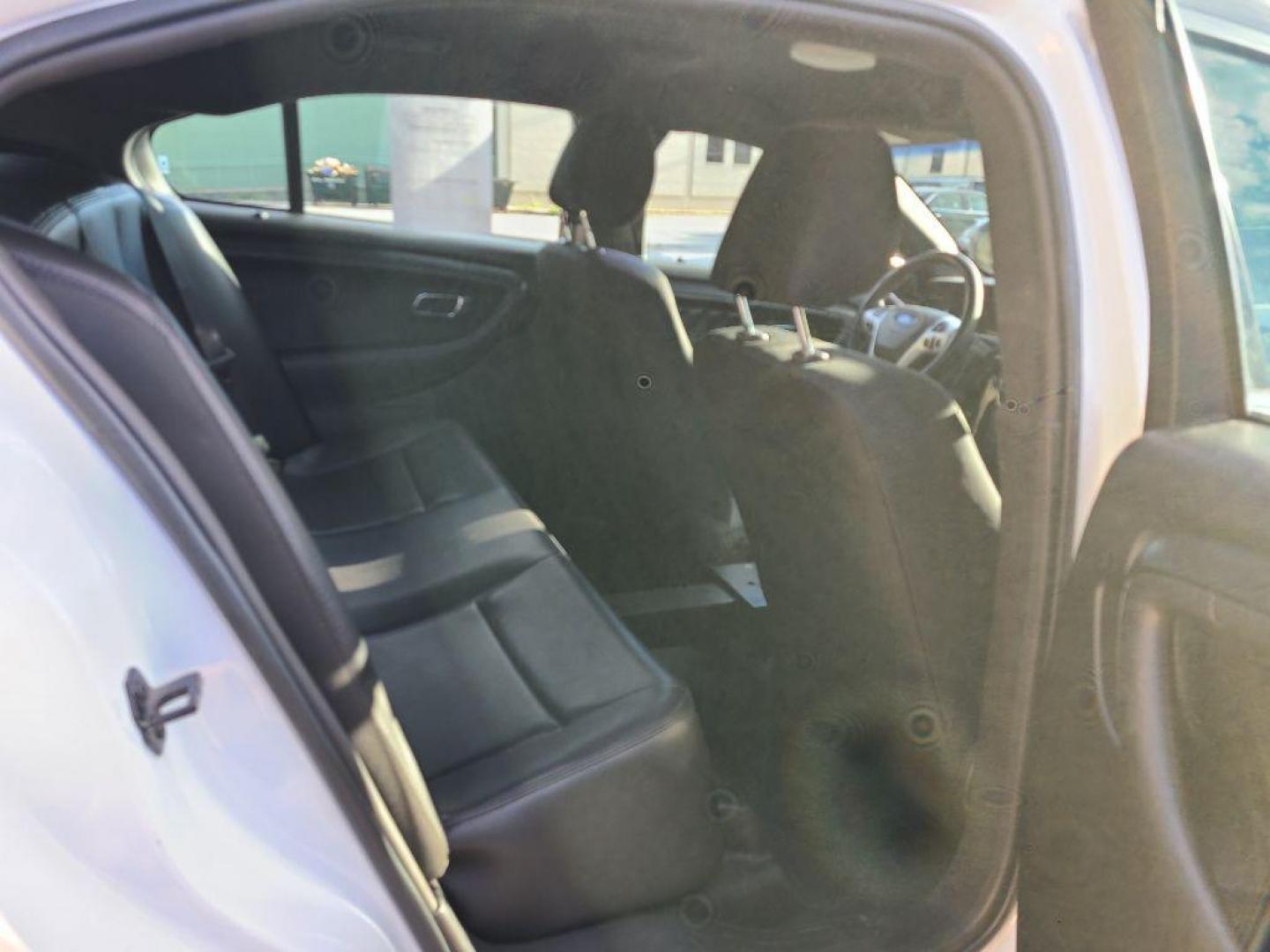 2014 WHITE FORD TAURUS POLICE INTERCEPTOR (1FAHP2MK5EG) with an 3.7L engine, Automatic transmission, located at 117 North Cameron Street, Harrisburg, PA, 17101, (717) 963-8962, 40.267021, -76.875351 - WE FINANCE!!! Good Credit/ Bad Credit/ No Credit - ALL Trade-Ins Welcomed!!! ***Guaranteed Credit Approval*** APPLY ONLINE or CALL us TODAY ;) Please call us to discuss your cash and financing options. - Photo#13