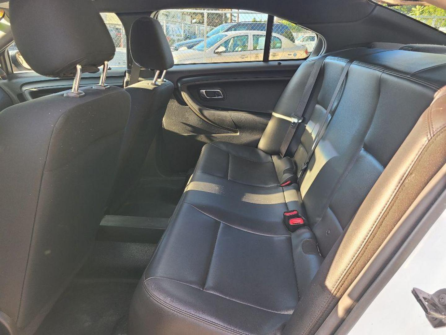 2014 WHITE FORD TAURUS POLICE INTERCEPTOR (1FAHP2MK5EG) with an 3.7L engine, Automatic transmission, located at 117 North Cameron Street, Harrisburg, PA, 17101, (717) 963-8962, 40.267021, -76.875351 - WE FINANCE!!! Good Credit/ Bad Credit/ No Credit - ALL Trade-Ins Welcomed!!! ***Guaranteed Credit Approval*** APPLY ONLINE or CALL us TODAY ;) Please call us to discuss your cash and financing options. - Photo#14