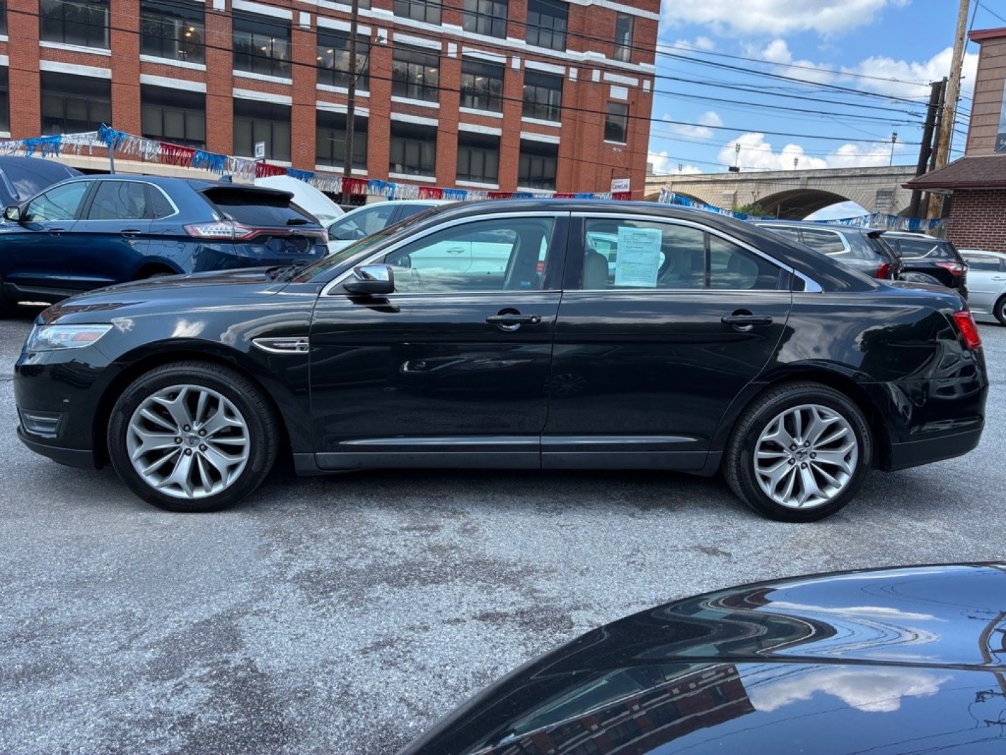 2014 BLACK FORD TAURUS LIMITED (1FAHP2J80EG) with an 3.5L engine, Automatic transmission, located at 117 North Cameron Street, Harrisburg, PA, 17101, (717) 963-8962, 40.267021, -76.875351 - WE FINANCE!!! MOST vehicles are available for financing. Good Credit/ Challenged Credit/ No Credit - ALL Trade-Ins Welcomed!!! APPLY ONLINE or CALL us TODAY Please call us to discuss your cash and/or financing options. Thanks for checking our inventory! We're here to help.- Photo#1