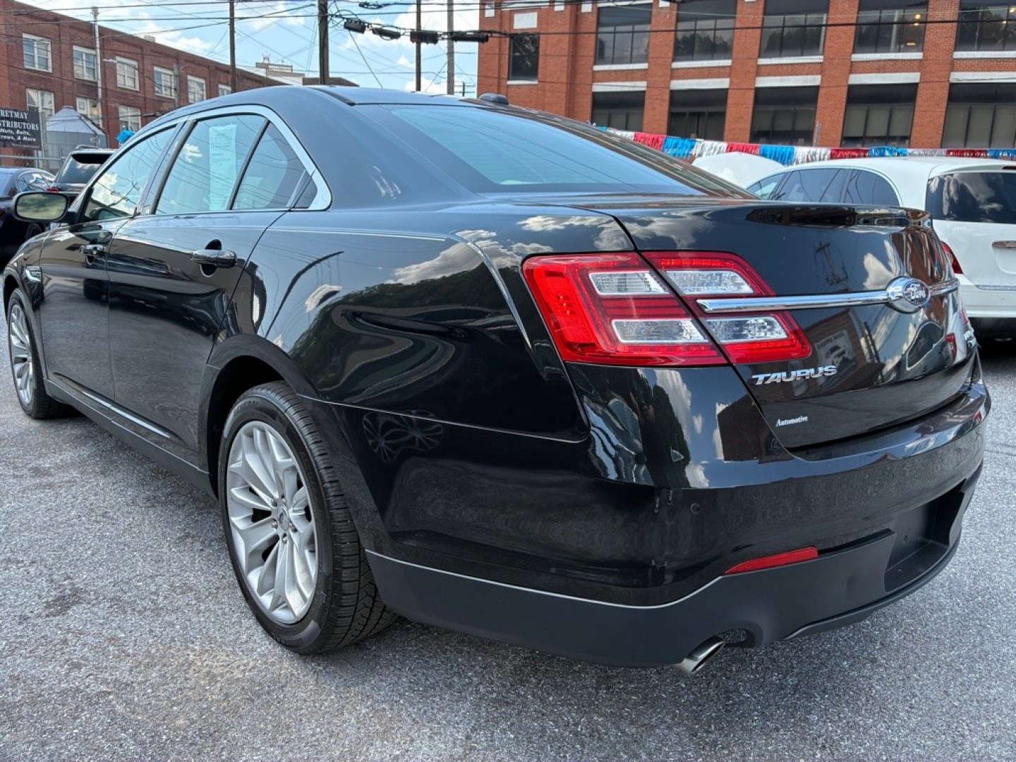 2014 BLACK FORD TAURUS LIMITED (1FAHP2J80EG) with an 3.5L engine, Automatic transmission, located at 117 North Cameron Street, Harrisburg, PA, 17101, (717) 963-8962, 40.267021, -76.875351 - WE FINANCE!!! MOST vehicles are available for financing. Good Credit/ Challenged Credit/ No Credit - ALL Trade-Ins Welcomed!!! APPLY ONLINE or CALL us TODAY Please call us to discuss your cash and/or financing options. Thanks for checking our inventory! We're here to help.- Photo#2