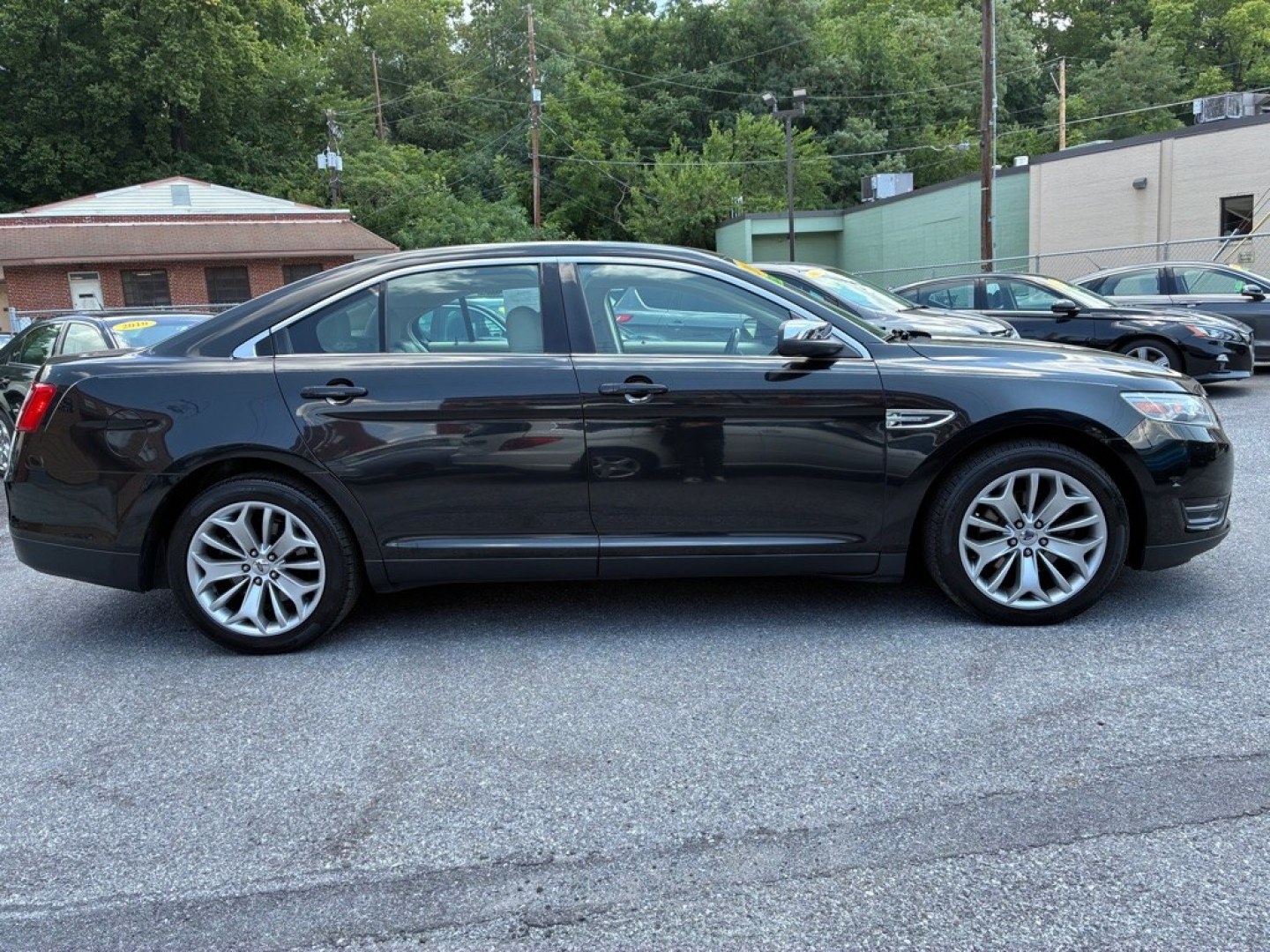 2014 BLACK FORD TAURUS LIMITED (1FAHP2J80EG) with an 3.5L engine, Automatic transmission, located at 117 North Cameron Street, Harrisburg, PA, 17101, (717) 963-8962, 40.267021, -76.875351 - WE FINANCE!!! MOST vehicles are available for financing. Good Credit/ Challenged Credit/ No Credit - ALL Trade-Ins Welcomed!!! APPLY ONLINE or CALL us TODAY Please call us to discuss your cash and/or financing options. Thanks for checking our inventory! We're here to help.- Photo#5