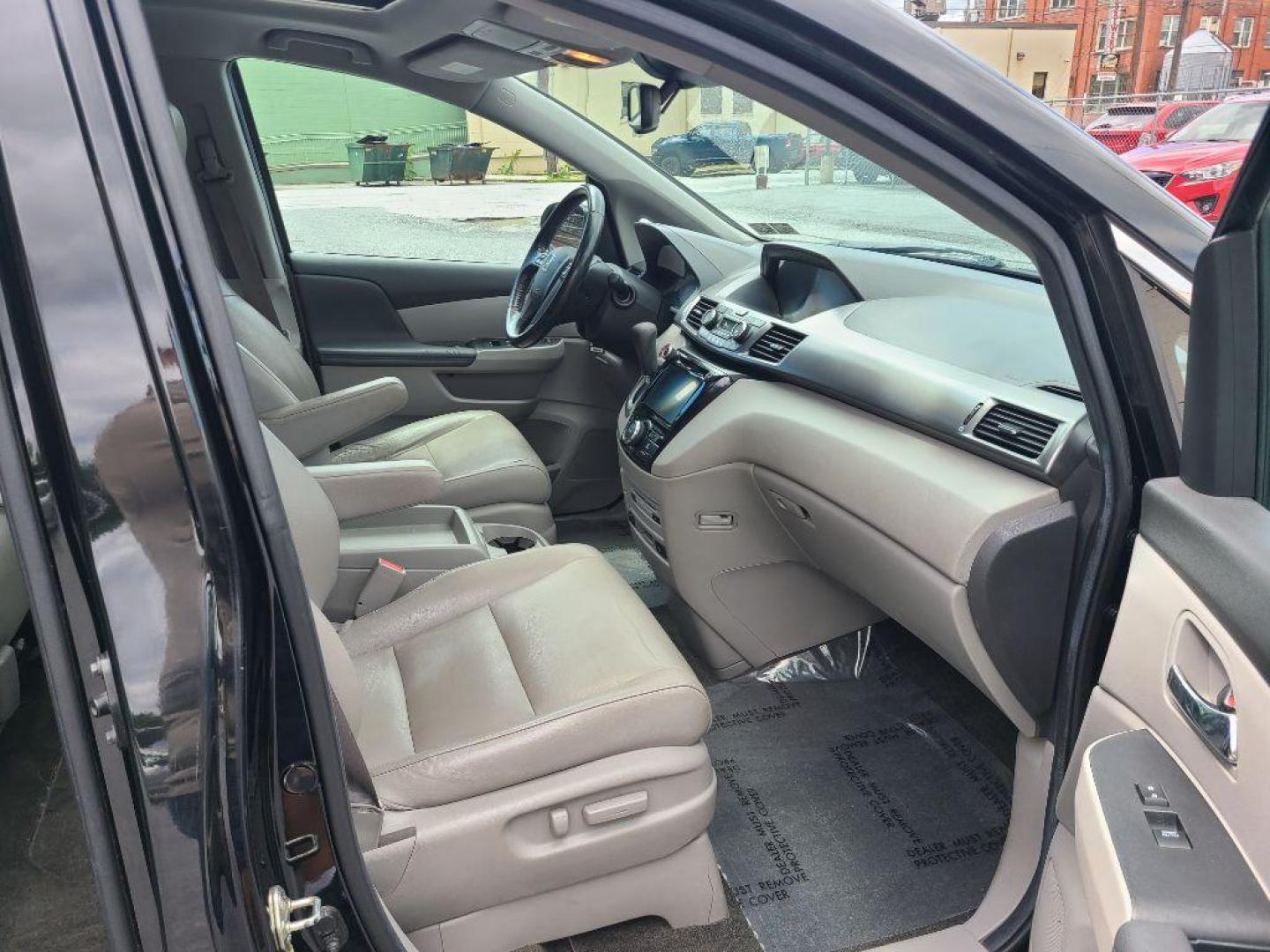 2014 BLACK HONDA ODYSSEY EXL (5FNRL5H65EB) with an 3.5L engine, Automatic transmission, located at 117 North Cameron Street, Harrisburg, PA, 17101, (717) 963-8962, 40.267021, -76.875351 - WE FINANCE!!! Good Credit/ Bad Credit/ No Credit - ALL Trade-Ins Welcomed!!! ***Guaranteed Credit Approval*** APPLY ONLINE or CALL us TODAY ;) Internet Prices and Marketplace Prices are SPECIAL discounted ***CASH DEALS*** Retail Prices are higher. Please call us to discuss your cash and finan - Photo#16