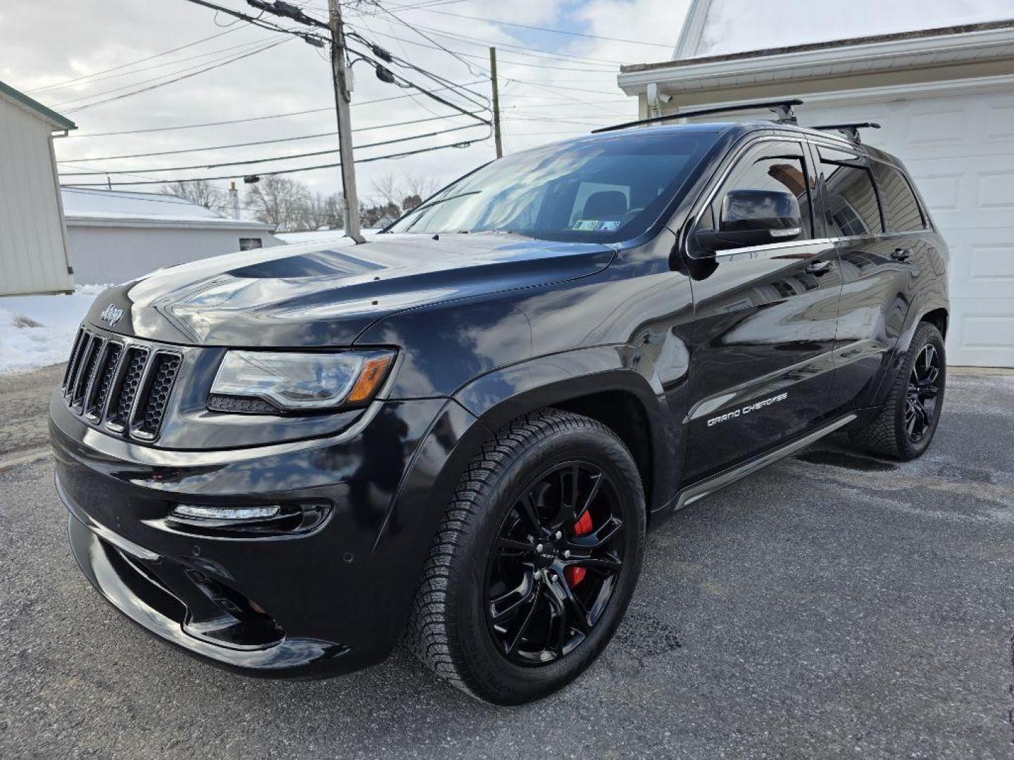 2014 BLACK JEEP GRAND CHEROKEE SRT-8 (1C4RJFDJ4EC) with an 6.4L engine, Automatic transmission, located at 131 N Cameron st, Harrisburg, PA, 17101, (717) 561-2926, 40.267086, -76.875374 - WE FINANCE!!! Good Credit/ Challenged Credit/ No Credit - ALL Trade-Ins Welcomed!!! APPLY ONLINE or CALL us TODAY ;) Please call us to discuss your cash and/or financing options. - Photo#0