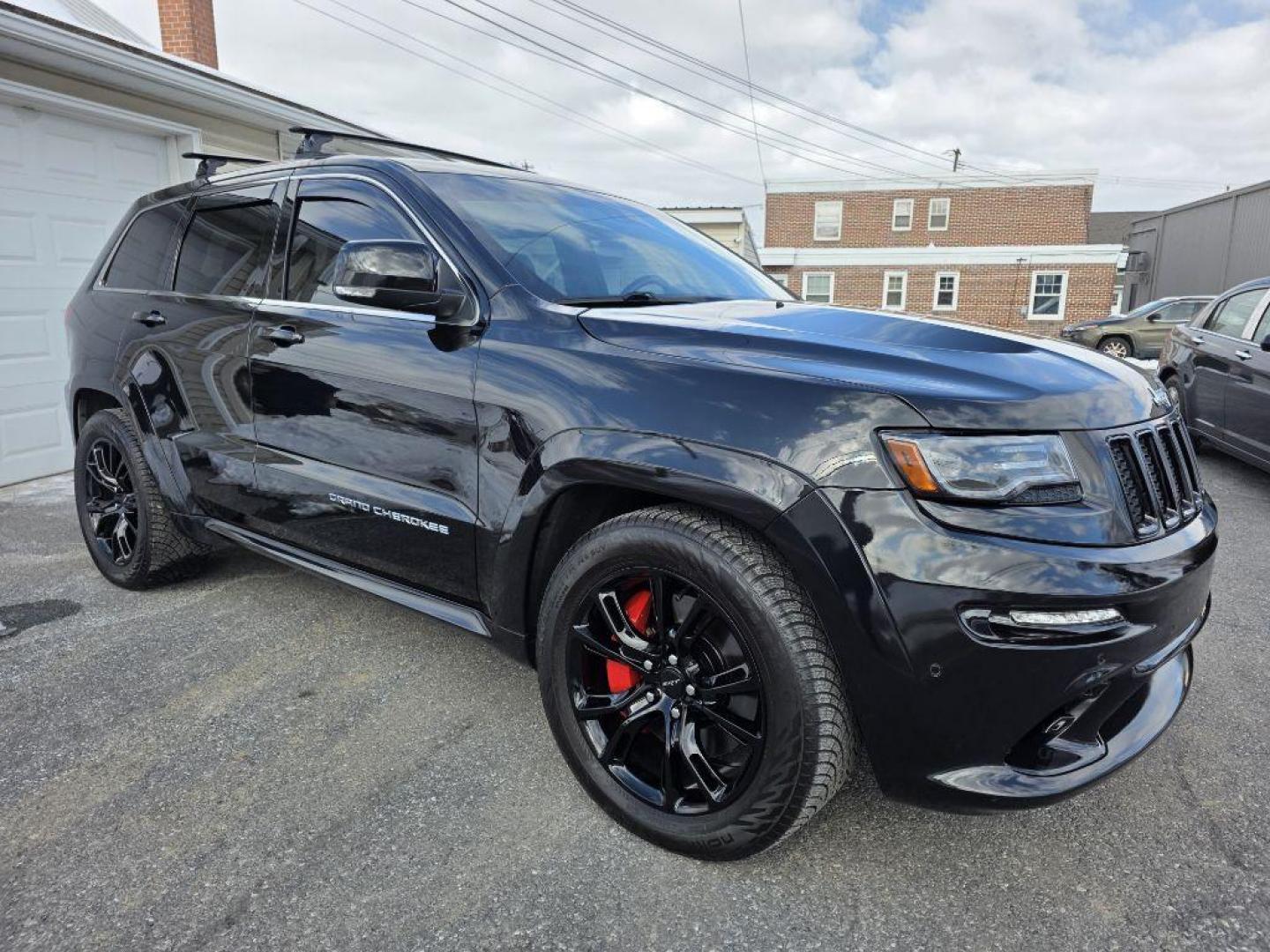 2014 BLACK JEEP GRAND CHEROKEE SRT-8 (1C4RJFDJ4EC) with an 6.4L engine, Automatic transmission, located at 131 N Cameron st, Harrisburg, PA, 17101, (717) 561-2926, 40.267086, -76.875374 - WE FINANCE!!! Good Credit/ Challenged Credit/ No Credit - ALL Trade-Ins Welcomed!!! APPLY ONLINE or CALL us TODAY ;) Please call us to discuss your cash and/or financing options. - Photo#6