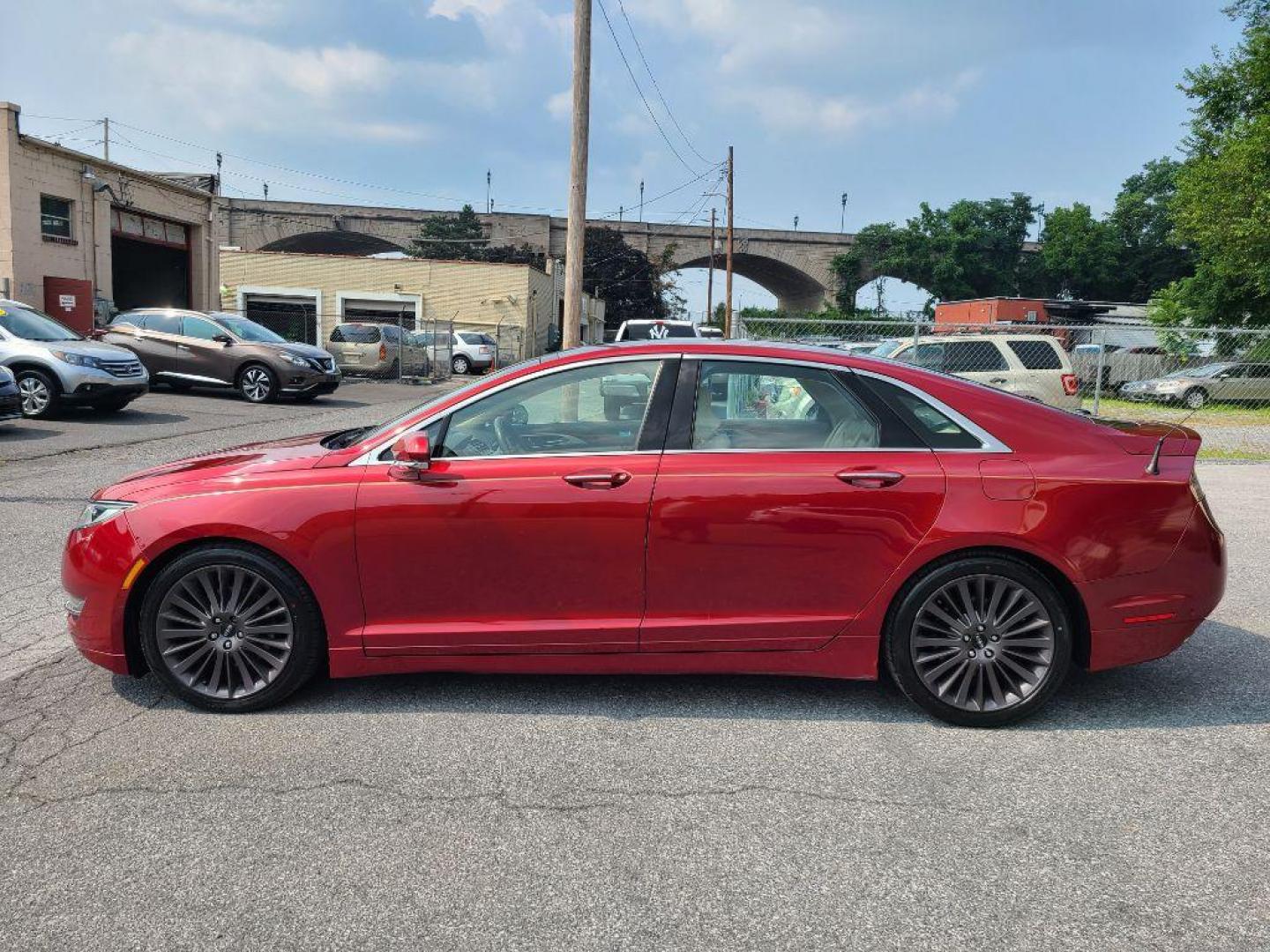 2014 RED LINCOLN MKZ AWD (3LN6L2J97ER) with an 2.0L engine, Automatic transmission, located at 117 North Cameron Street, Harrisburg, PA, 17101, (717) 963-8962, 40.267021, -76.875351 - WE FINANCE!!! Good Credit/ Bad Credit/ No Credit - ALL Trade-Ins Welcomed!!! ***Guaranteed Credit Approval*** APPLY ONLINE or CALL us TODAY ;) Internet Prices and Marketplace Prices are SPECIAL discounted ***CASH DEALS*** Retail Prices are higher. Please call us to discuss your cash and finan - Photo#2