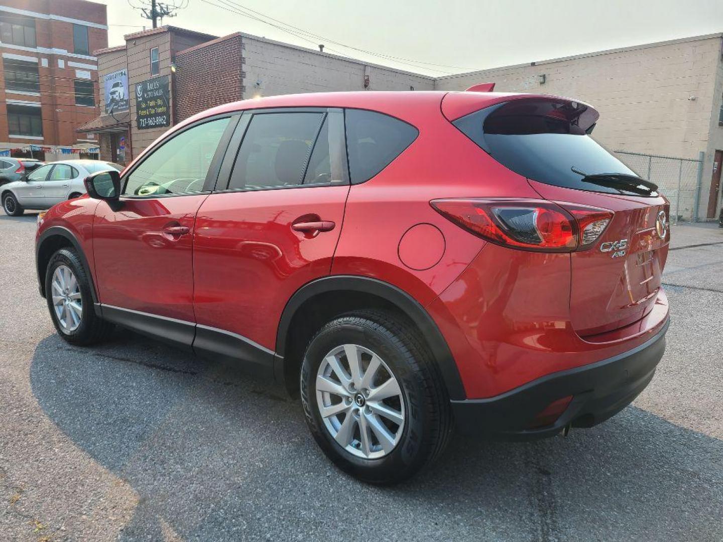 2014 RED MAZDA CX-5 TOURING (JM3KE4CY8E0) with an 2.5L engine, Automatic transmission, located at 7981 Paxton Street, Harrisburg, PA, 17111, (717) 561-2926, 40.261490, -76.749229 - WE FINANCE!!! Good Credit/ Bad Credit/ No Credit - ALL Trade-Ins Welcomed!!! ***Guaranteed Credit Approval*** APPLY ONLINE or CALL us TODAY ;) Internet Prices and Marketplace Prices are SPECIAL discounted ***CASH DEALS*** Retail Prices are higher. Please call us to discuss your cash and finan - Photo#3