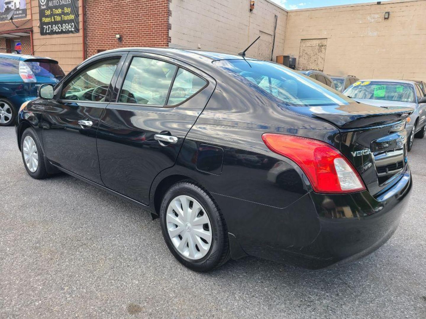 2014 BLUE NISSAN VERSA S (3N1CN7AP7EL) with an 1.6L engine, Continuously Variable transmission, located at 7981 Paxton Street, Harrisburg, PA, 17111, (717) 561-2926, 40.261490, -76.749229 - WE FINANCE!!! Good Credit/ Bad Credit/ No Credit - ALL Trade-Ins Welcomed!!! ***Guaranteed Credit Approval*** APPLY ONLINE or CALL us TODAY ;) Internet Prices and Marketplace Prices are SPECIAL discounted ***CASH DEALS*** Retail Prices are higher. Please call us to discuss your cash and finan - Photo#2