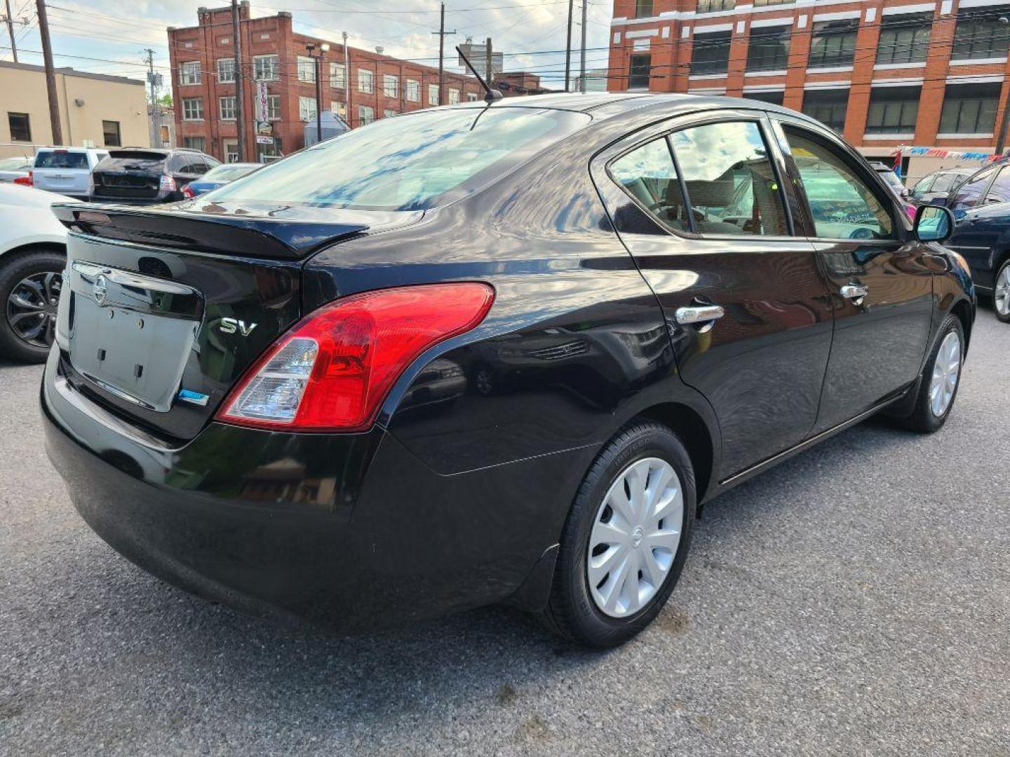 2014 BLUE NISSAN VERSA S (3N1CN7AP7EL) with an 1.6L engine, Continuously Variable transmission, located at 7981 Paxton Street, Harrisburg, PA, 17111, (717) 561-2926, 40.261490, -76.749229 - WE FINANCE!!! Good Credit/ Bad Credit/ No Credit - ALL Trade-Ins Welcomed!!! ***Guaranteed Credit Approval*** APPLY ONLINE or CALL us TODAY ;) Internet Prices and Marketplace Prices are SPECIAL discounted ***CASH DEALS*** Retail Prices are higher. Please call us to discuss your cash and finan - Photo#4