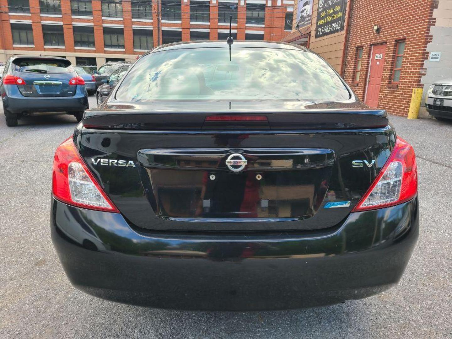2014 BLUE NISSAN VERSA S (3N1CN7AP7EL) with an 1.6L engine, Continuously Variable transmission, located at 7981 Paxton Street, Harrisburg, PA, 17111, (717) 561-2926, 40.261490, -76.749229 - WE FINANCE!!! Good Credit/ Bad Credit/ No Credit - ALL Trade-Ins Welcomed!!! ***Guaranteed Credit Approval*** APPLY ONLINE or CALL us TODAY ;) Internet Prices and Marketplace Prices are SPECIAL discounted ***CASH DEALS*** Retail Prices are higher. Please call us to discuss your cash and finan - Photo#3