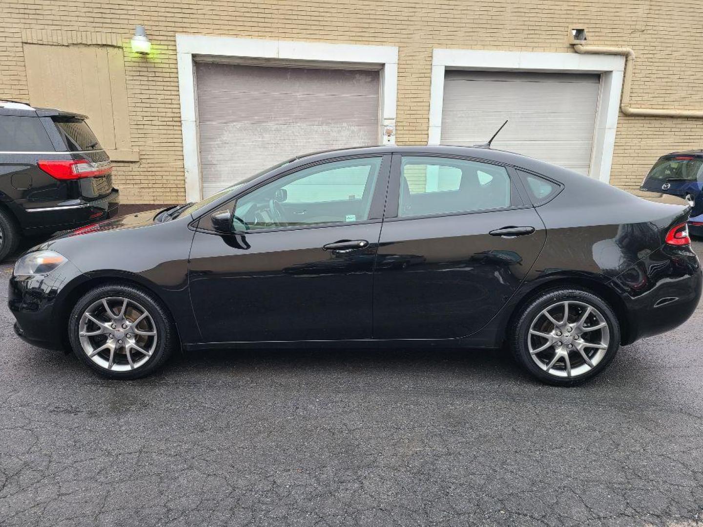 2015 BLACK DODGE DART SXT (1C3CDFBB5FD) with an 2.4L engine, 6-Speed Manual transmission, located at 117 North Cameron Street, Harrisburg, PA, 17101, (717) 963-8962, 40.267021, -76.875351 - Photo#1