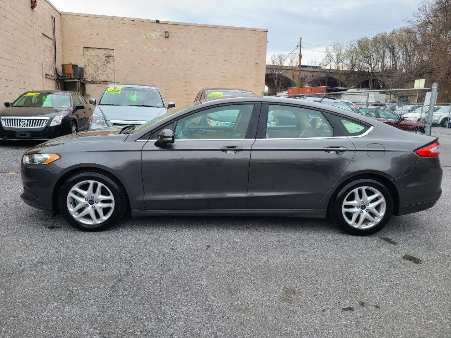 2015 GRAY FORD FUSION SE (1FA6P0H76F5) with an 2.5L engine, Automatic transmission, located at 117 North Cameron Street, Harrisburg, PA, 17101, (717) 963-8962, 40.267021, -76.875351 - WE FINANCE!!! Good Credit/ Bad Credit/ No Credit - ALL Trade-Ins Welcomed!!! ***Guaranteed Credit Approval*** APPLY ONLINE or CALL us TODAY ;) Internet Prices and Marketplace Prices are SPECIAL discounted ***CASH DEALS*** Retail Prices are higher. Please call us to discuss your cash and finan - Photo#1
