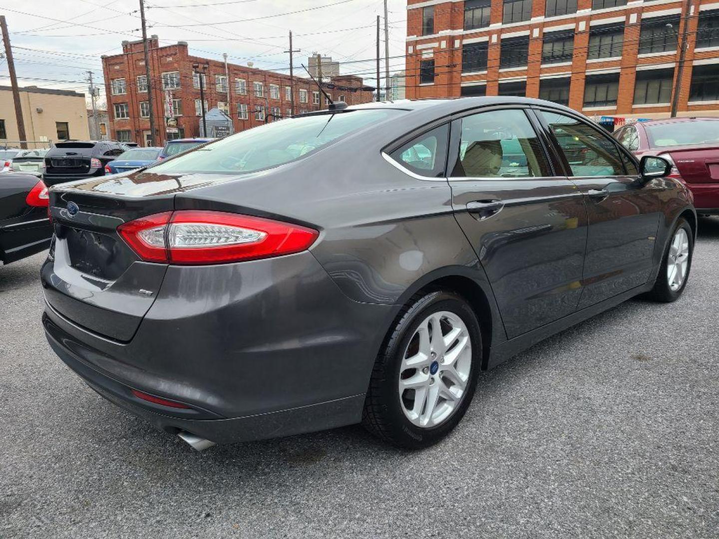 2015 GRAY FORD FUSION SE (1FA6P0H76F5) with an 2.5L engine, Automatic transmission, located at 117 North Cameron Street, Harrisburg, PA, 17101, (717) 963-8962, 40.267021, -76.875351 - WE FINANCE!!! Good Credit/ Bad Credit/ No Credit - ALL Trade-Ins Welcomed!!! ***Guaranteed Credit Approval*** APPLY ONLINE or CALL us TODAY ;) Internet Prices and Marketplace Prices are SPECIAL discounted ***CASH DEALS*** Retail Prices are higher. Please call us to discuss your cash and finan - Photo#4