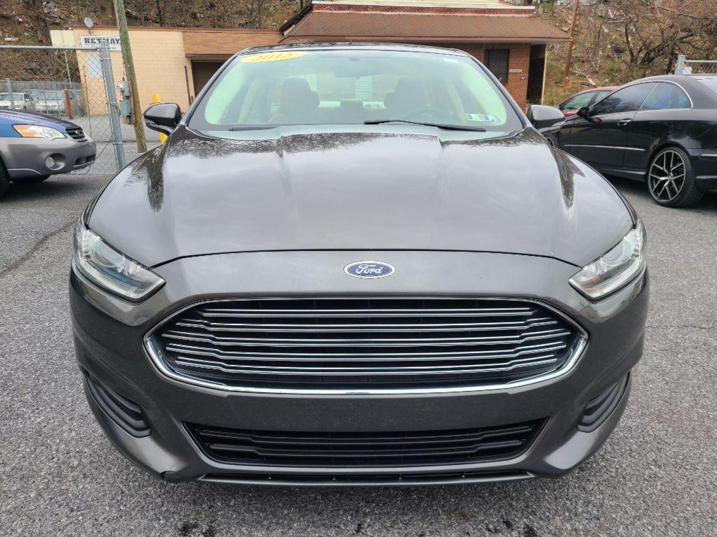 2015 GRAY FORD FUSION SE (1FA6P0H76F5) with an 2.5L engine, Automatic transmission, located at 117 North Cameron Street, Harrisburg, PA, 17101, (717) 963-8962, 40.267021, -76.875351 - WE FINANCE!!! Good Credit/ Bad Credit/ No Credit - ALL Trade-Ins Welcomed!!! ***Guaranteed Credit Approval*** APPLY ONLINE or CALL us TODAY ;) Internet Prices and Marketplace Prices are SPECIAL discounted ***CASH DEALS*** Retail Prices are higher. Please call us to discuss your cash and finan - Photo#7