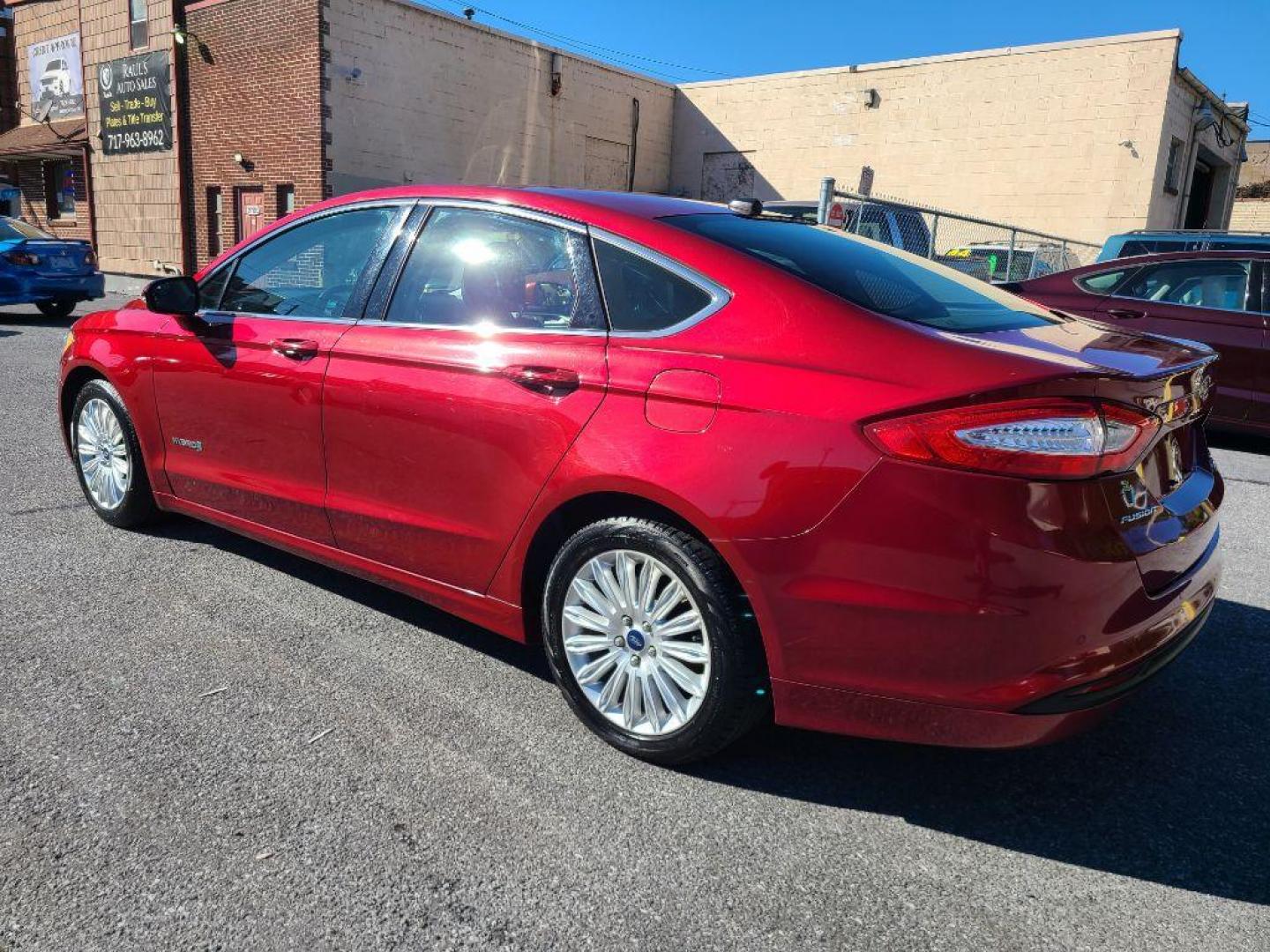 2015 RED FORD FUSION SE HYBRID (3FA6P0LU9FR) with an 2.0L engine, Continuously Variable transmission, located at 117 North Cameron Street, Harrisburg, PA, 17101, (717) 963-8962, 40.267021, -76.875351 - WE FINANCE!!! Good Credit/ Bad Credit/ No Credit - ALL Trade-Ins Welcomed!!! ***Guaranteed Credit Approval*** APPLY ONLINE or CALL us TODAY ;) Please call us to discuss your cash and financing options. - Photo#2