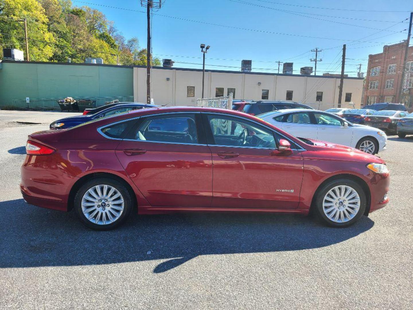 2015 RED FORD FUSION SE HYBRID (3FA6P0LU9FR) with an 2.0L engine, Continuously Variable transmission, located at 117 North Cameron Street, Harrisburg, PA, 17101, (717) 963-8962, 40.267021, -76.875351 - WE FINANCE!!! Good Credit/ Bad Credit/ No Credit - ALL Trade-Ins Welcomed!!! ***Guaranteed Credit Approval*** APPLY ONLINE or CALL us TODAY ;) Please call us to discuss your cash and financing options. - Photo#5