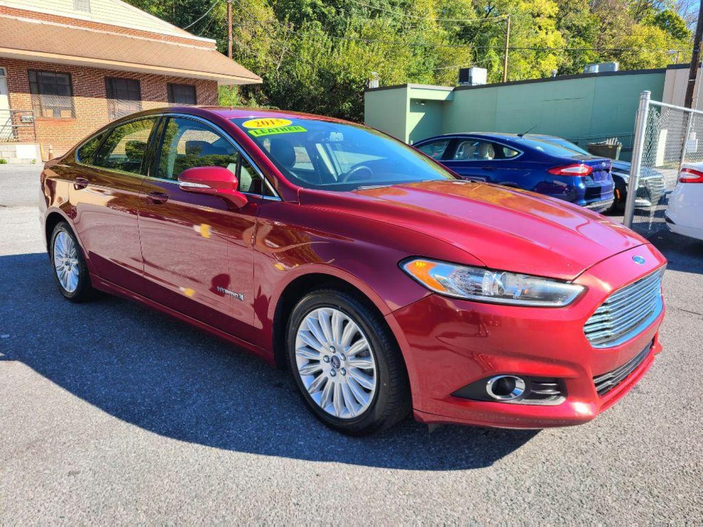 2015 RED FORD FUSION SE HYBRID (3FA6P0LU9FR) with an 2.0L engine, Continuously Variable transmission, located at 117 North Cameron Street, Harrisburg, PA, 17101, (717) 963-8962, 40.267021, -76.875351 - WE FINANCE!!! Good Credit/ Bad Credit/ No Credit - ALL Trade-Ins Welcomed!!! ***Guaranteed Credit Approval*** APPLY ONLINE or CALL us TODAY ;) Please call us to discuss your cash and financing options. - Photo#6