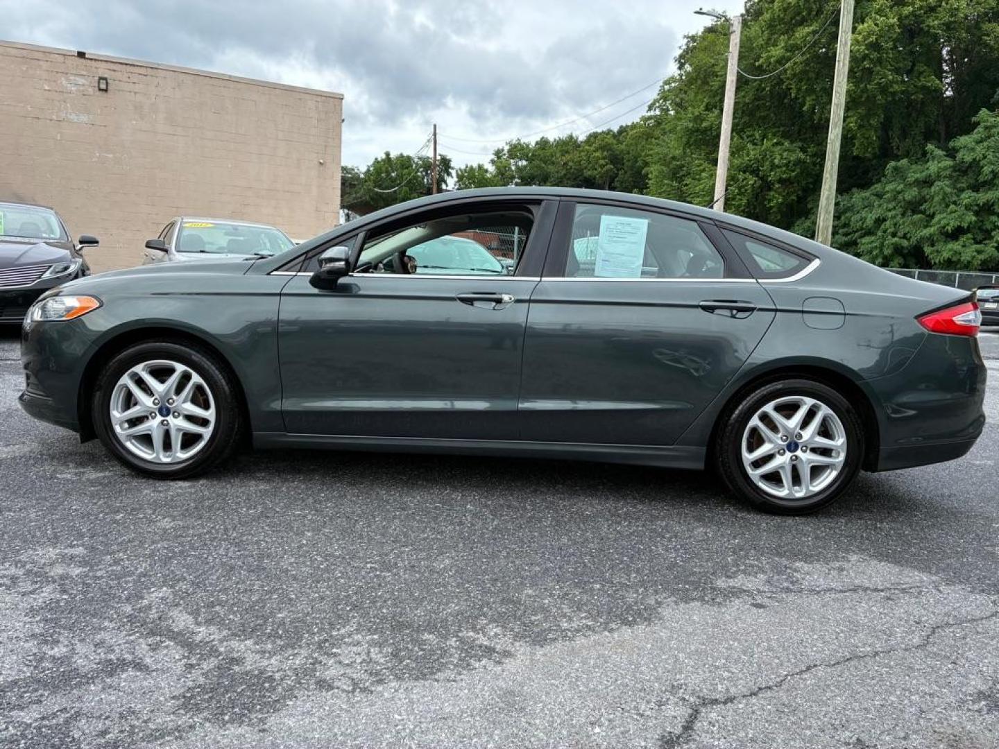 2015 GREEN FORD FUSION SE (3FA6P0HD4FR) with an 1.5L engine, Automatic transmission, located at 117 North Cameron Street, Harrisburg, PA, 17101, (717) 963-8962, 40.267021, -76.875351 - WE FINANCE!!! MOST vehicles are available for financing. Good Credit/ Challenged Credit/ No Credit - ALL Trade-Ins Welcomed!!! APPLY ONLINE or CALL us TODAY Please call us to discuss your cash and/or financing options. Thanks for checking our inventory! We're here to help.- Photo#1