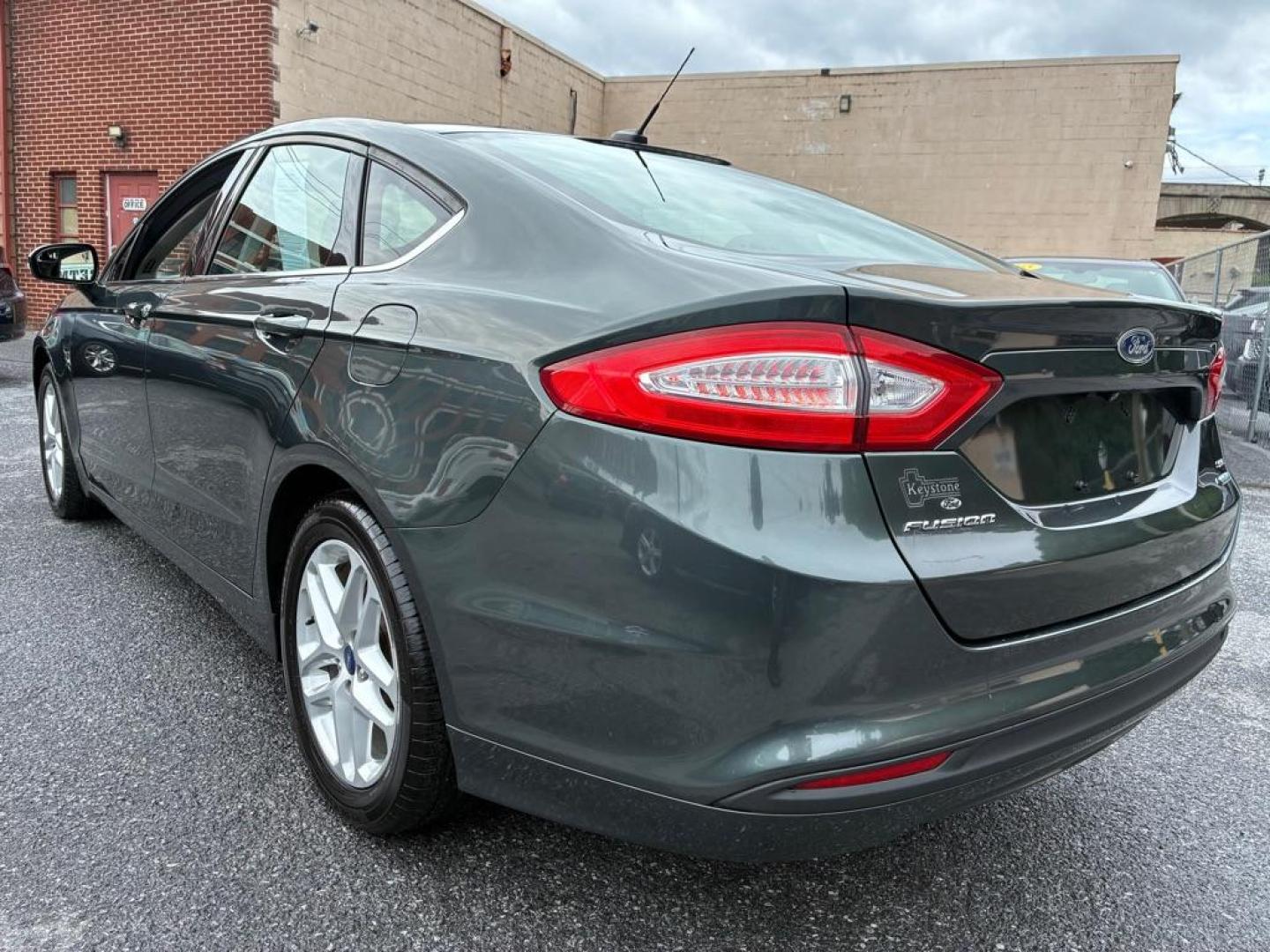 2015 GREEN FORD FUSION SE (3FA6P0HD4FR) with an 1.5L engine, Automatic transmission, located at 117 North Cameron Street, Harrisburg, PA, 17101, (717) 963-8962, 40.267021, -76.875351 - WE FINANCE!!! MOST vehicles are available for financing. Good Credit/ Challenged Credit/ No Credit - ALL Trade-Ins Welcomed!!! APPLY ONLINE or CALL us TODAY Please call us to discuss your cash and/or financing options. Thanks for checking our inventory! We're here to help.- Photo#2